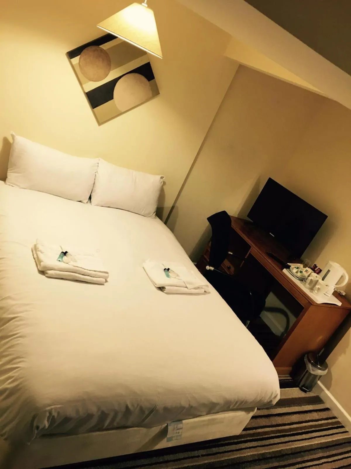 Bed in The Tudor House Hotel