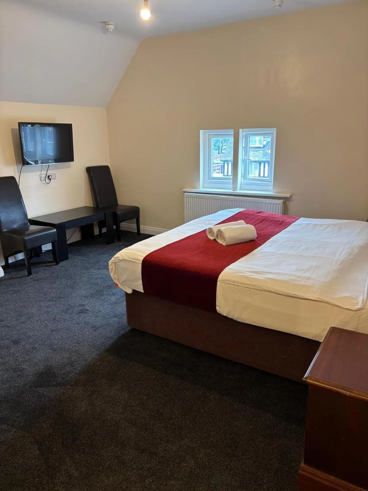 Bed in The Tudor House Hotel