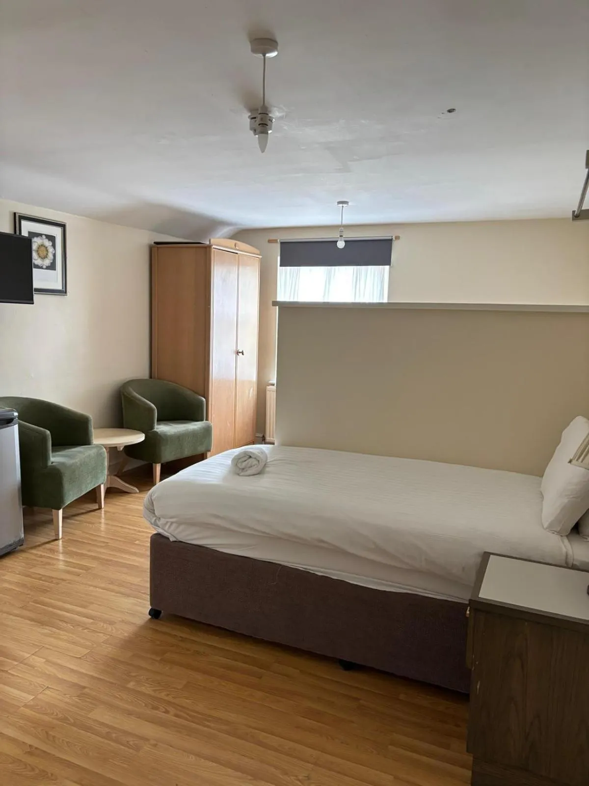 Bed in The Tudor House Hotel