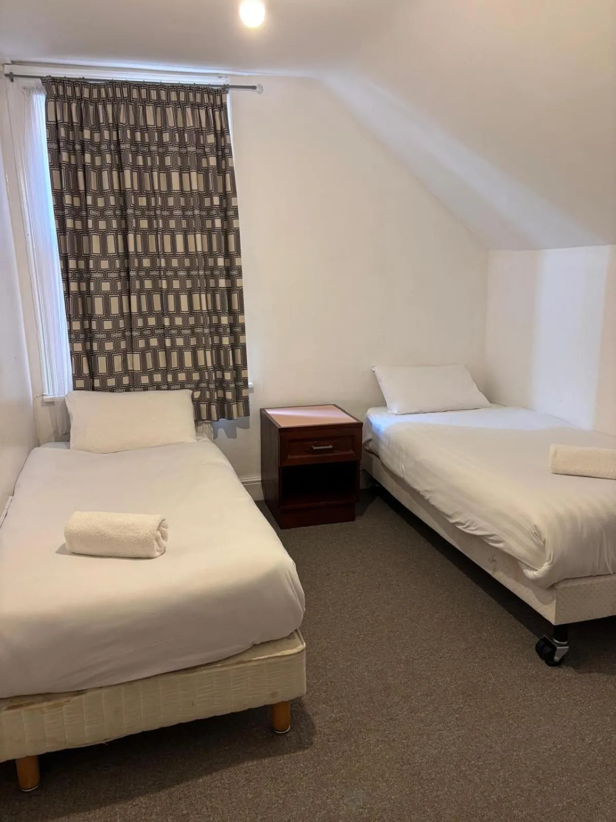 Bed in The Tudor House Hotel