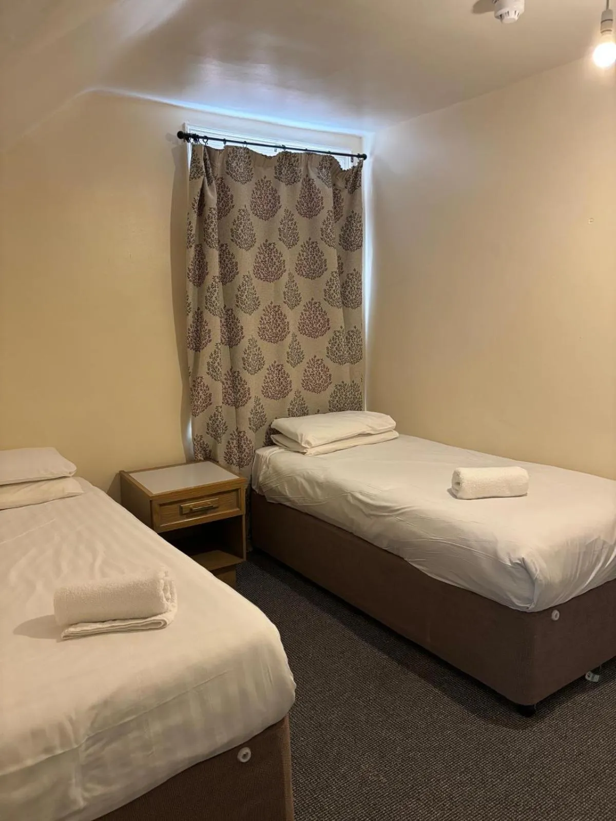 Bed in The Tudor House Hotel