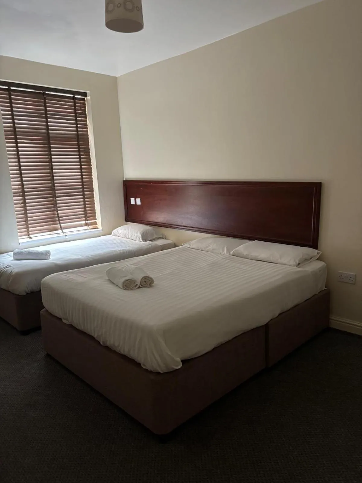 Bed in The Tudor House Hotel