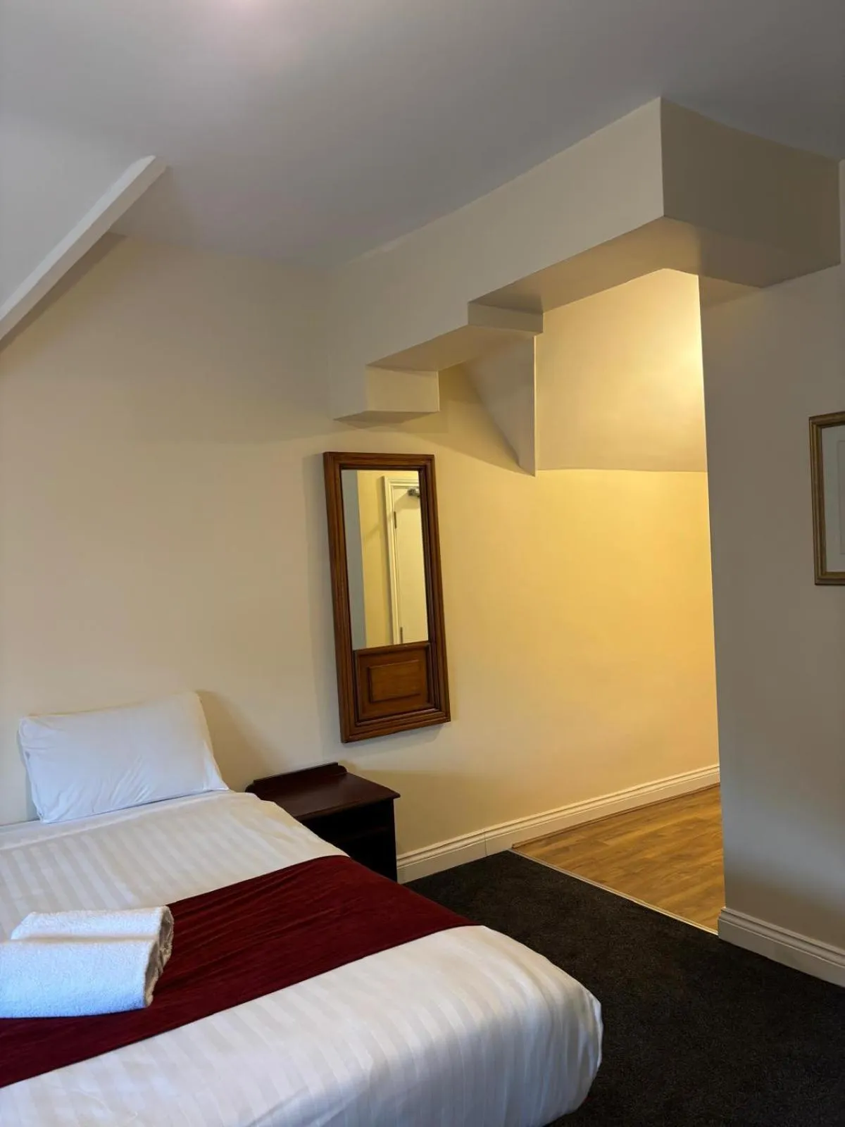 Bed in The Tudor House Hotel