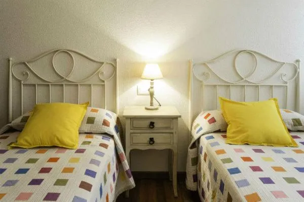 Bed in Apartamentos Cotiello