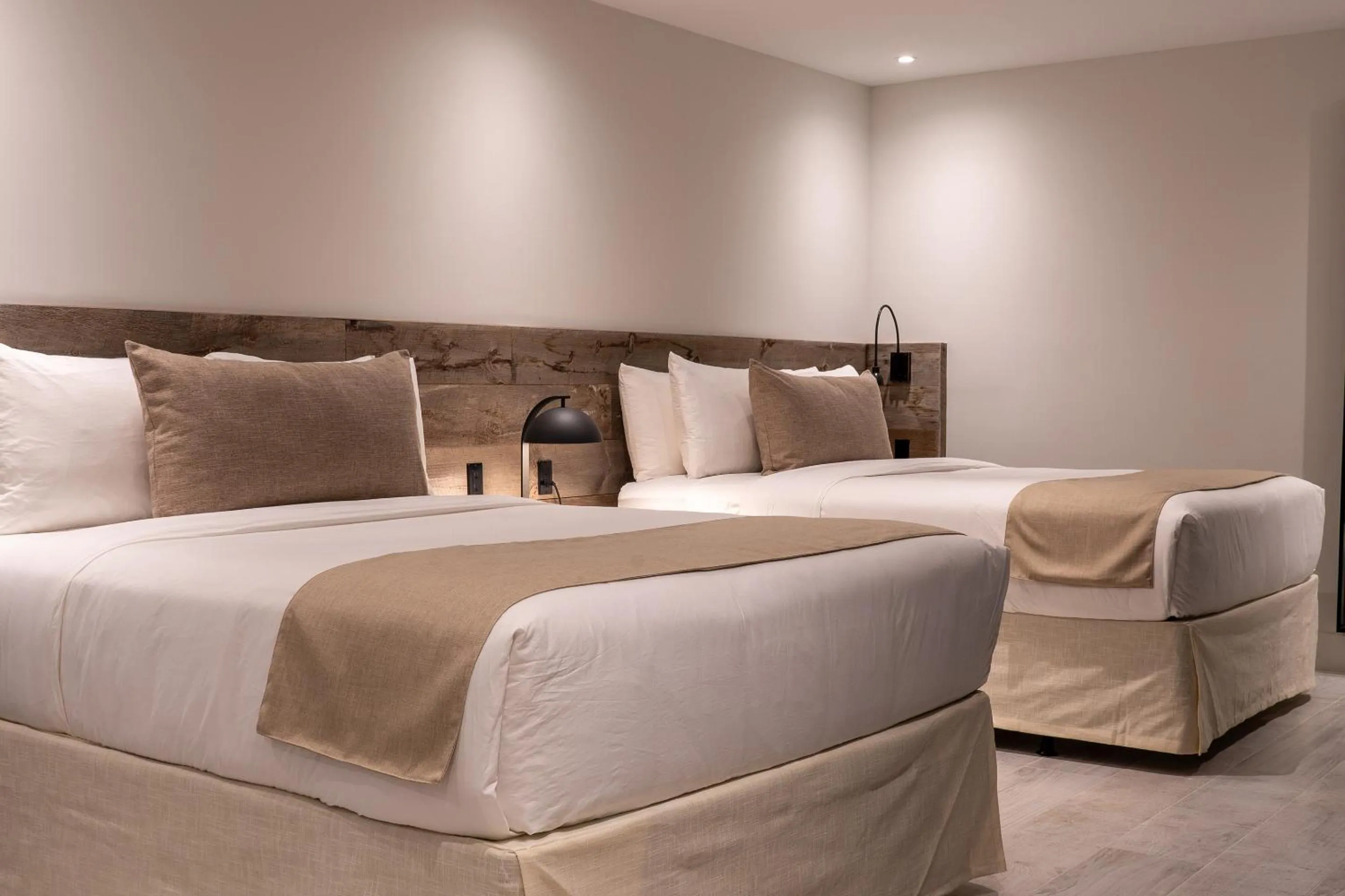 Bed in Nassau Suite South Beach, an All Suite Hotel