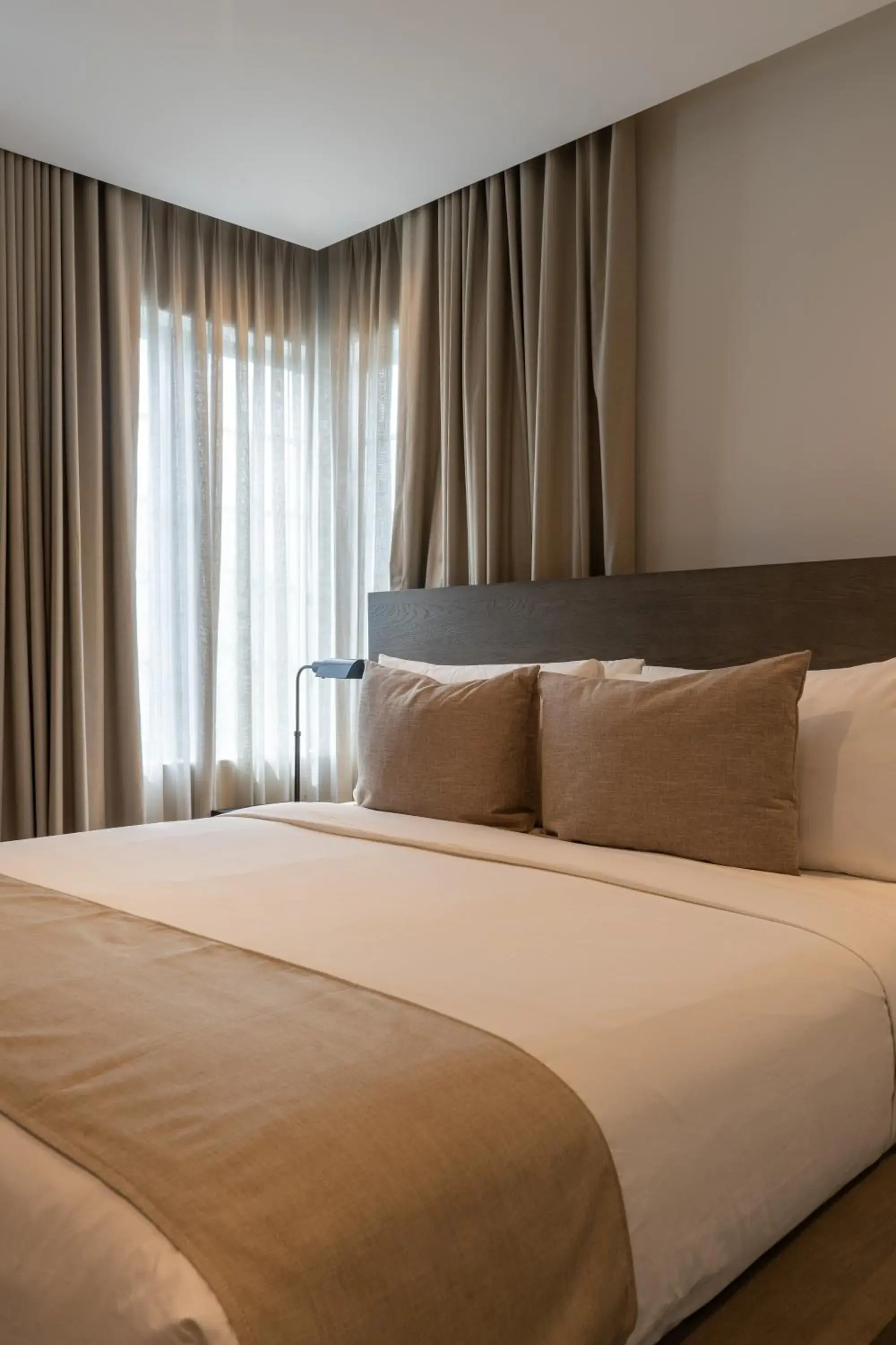 Bed in Nassau Suite South Beach, an All Suite Hotel Bed in Nassau Suite South Beach, an All Suite Hotel