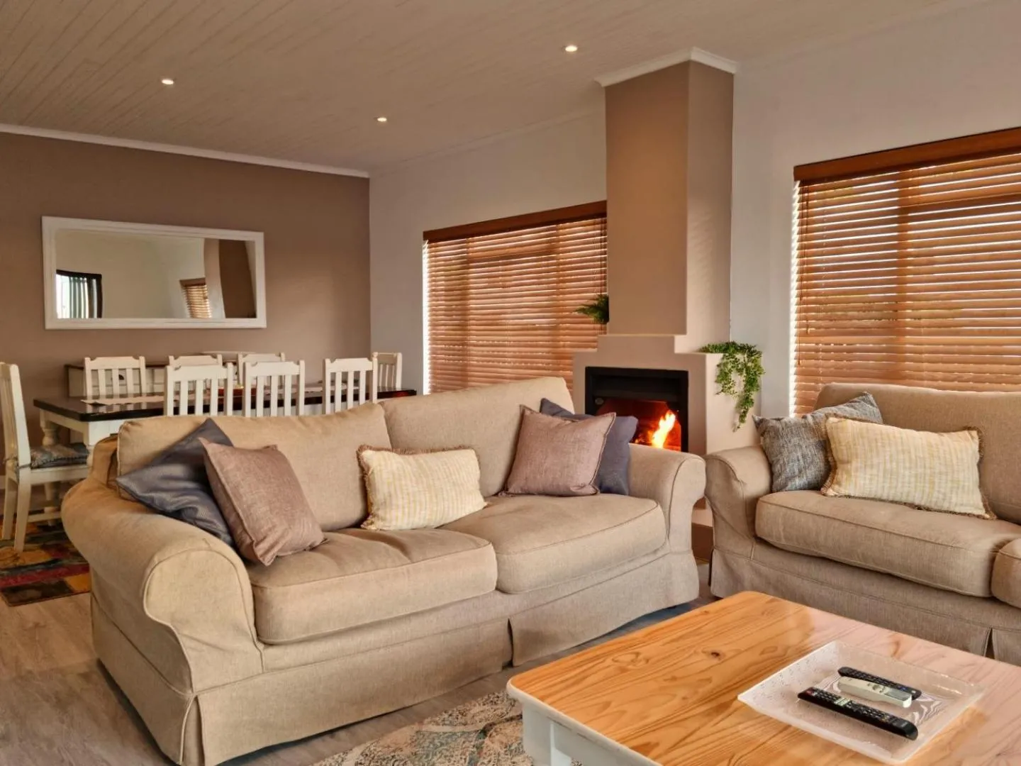 Living room in 'Die Braaihuis'- sleeps 6, Large Veranda, Sea Views, Central and Fabulous!