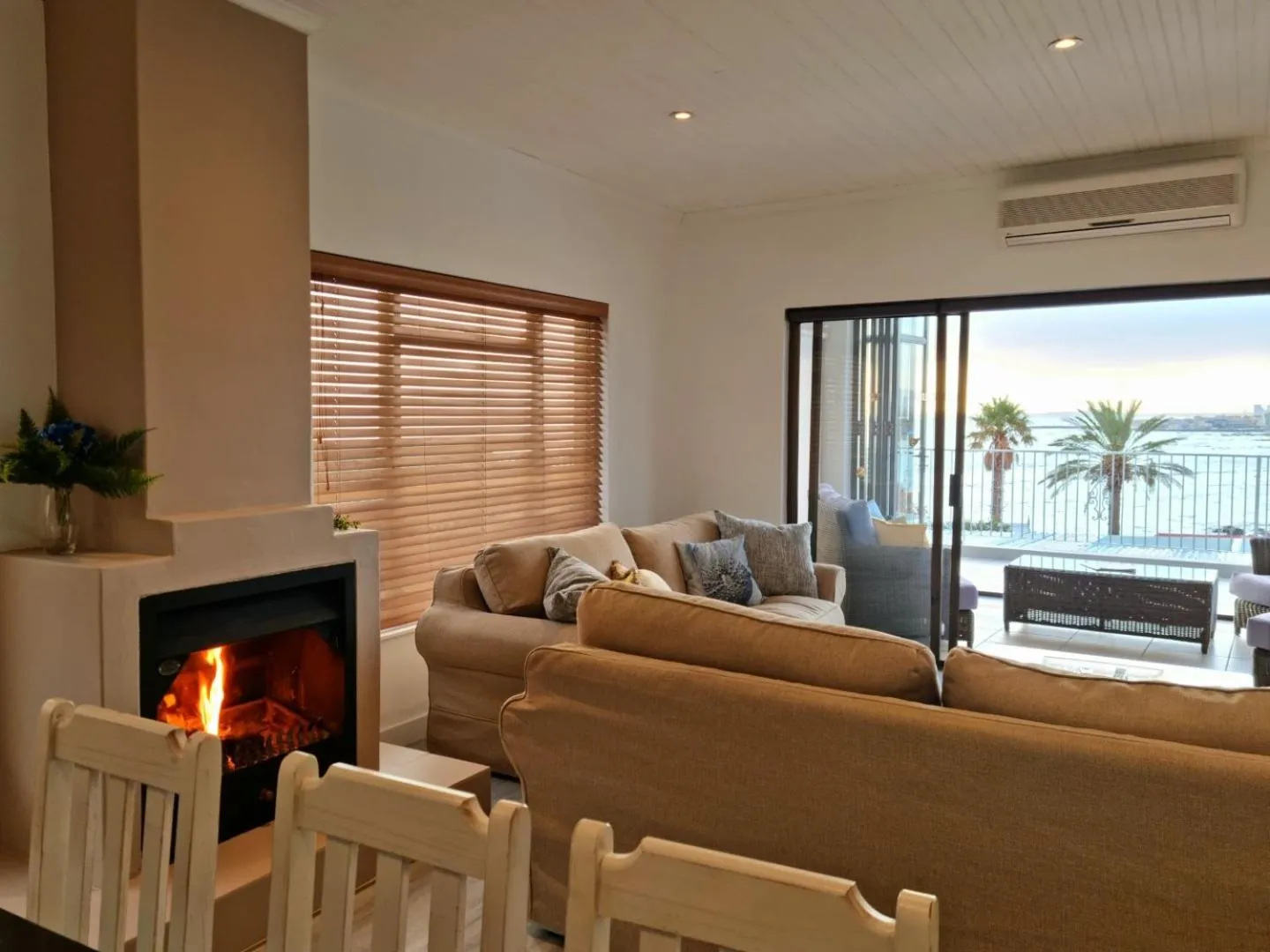 Living room in 'Die Braaihuis'- sleeps 6, Large Veranda, Sea Views, Central and Fabulous!