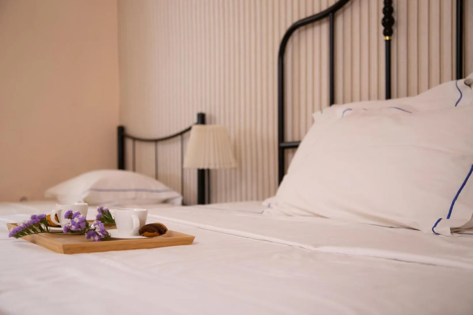 Bed in Poseidon Apartments and Villas by the Sea