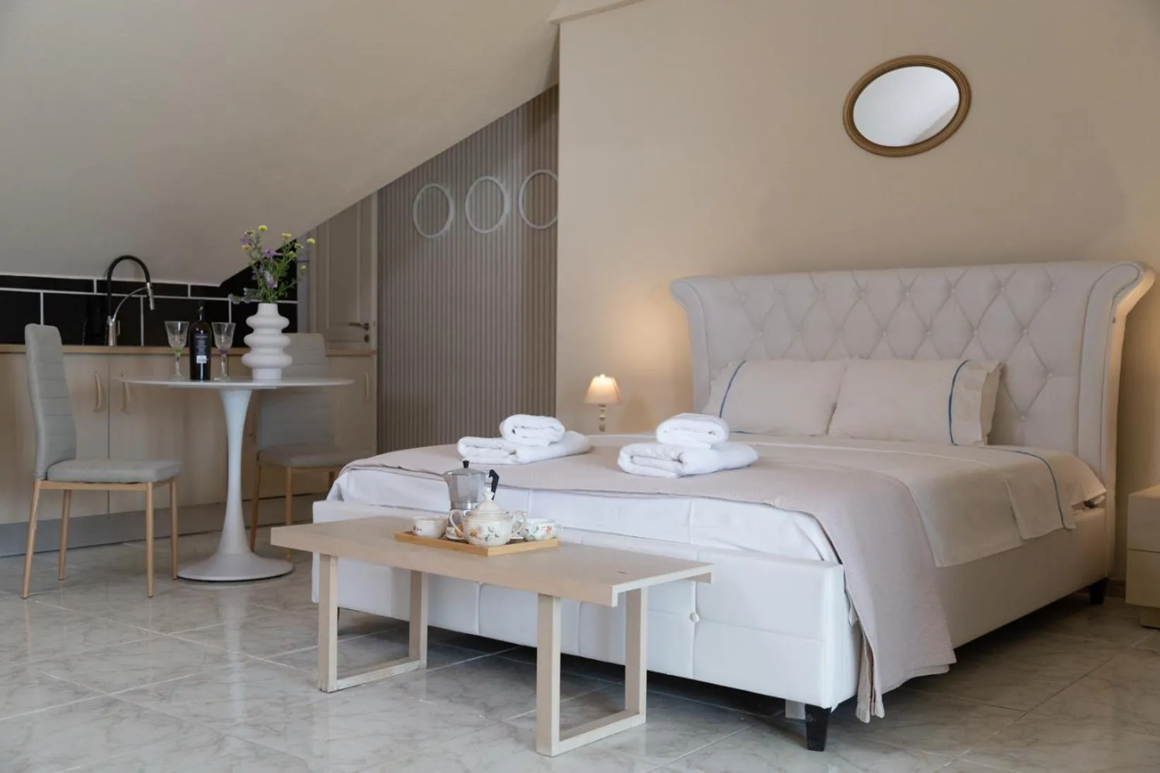 Bed in Poseidon Apartments and Villas by the Sea