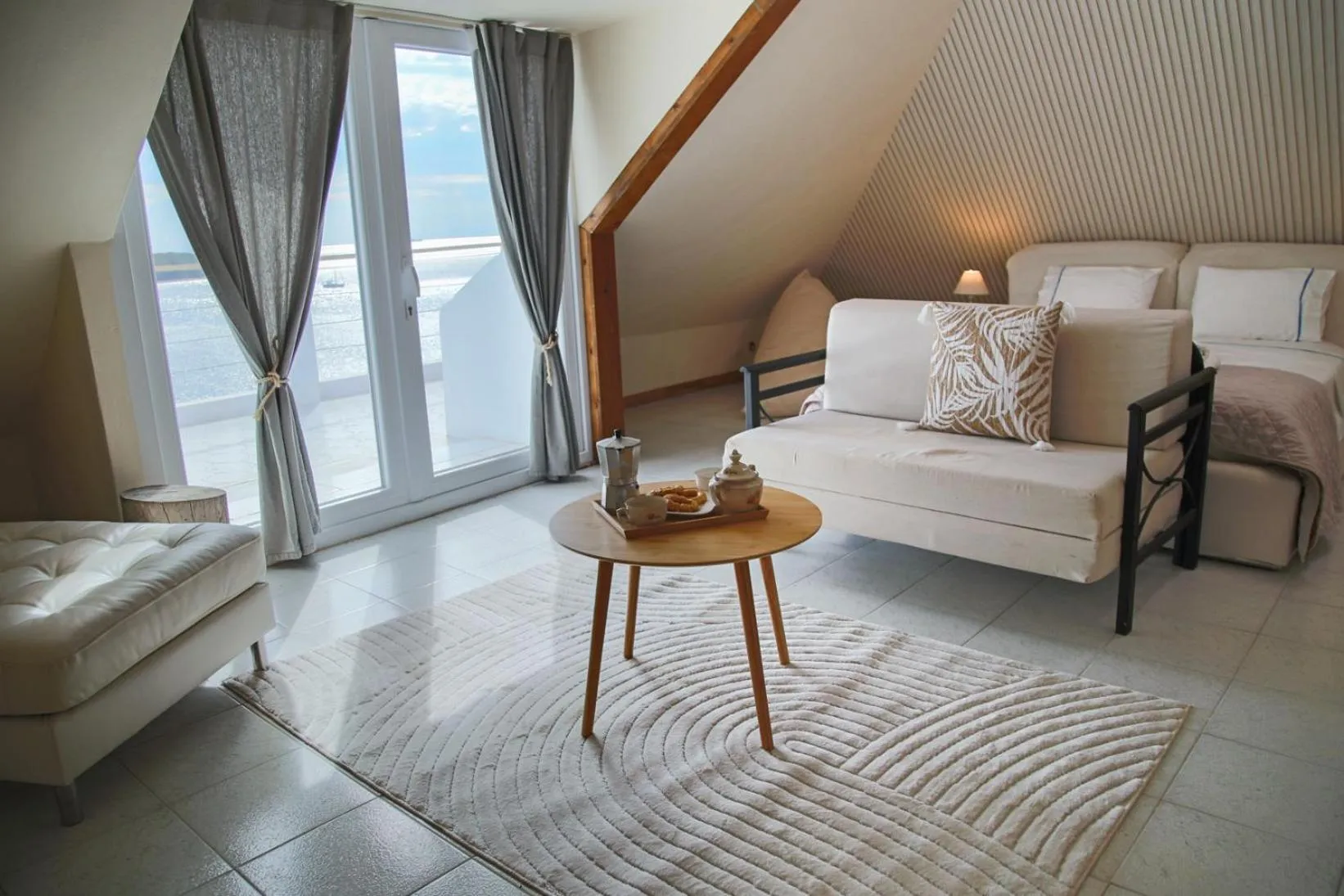 Bed in Poseidon Apartments and Villas by the Sea