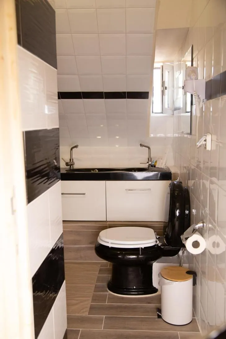 Toilet in Poseidon Apartments and Villas by the Sea