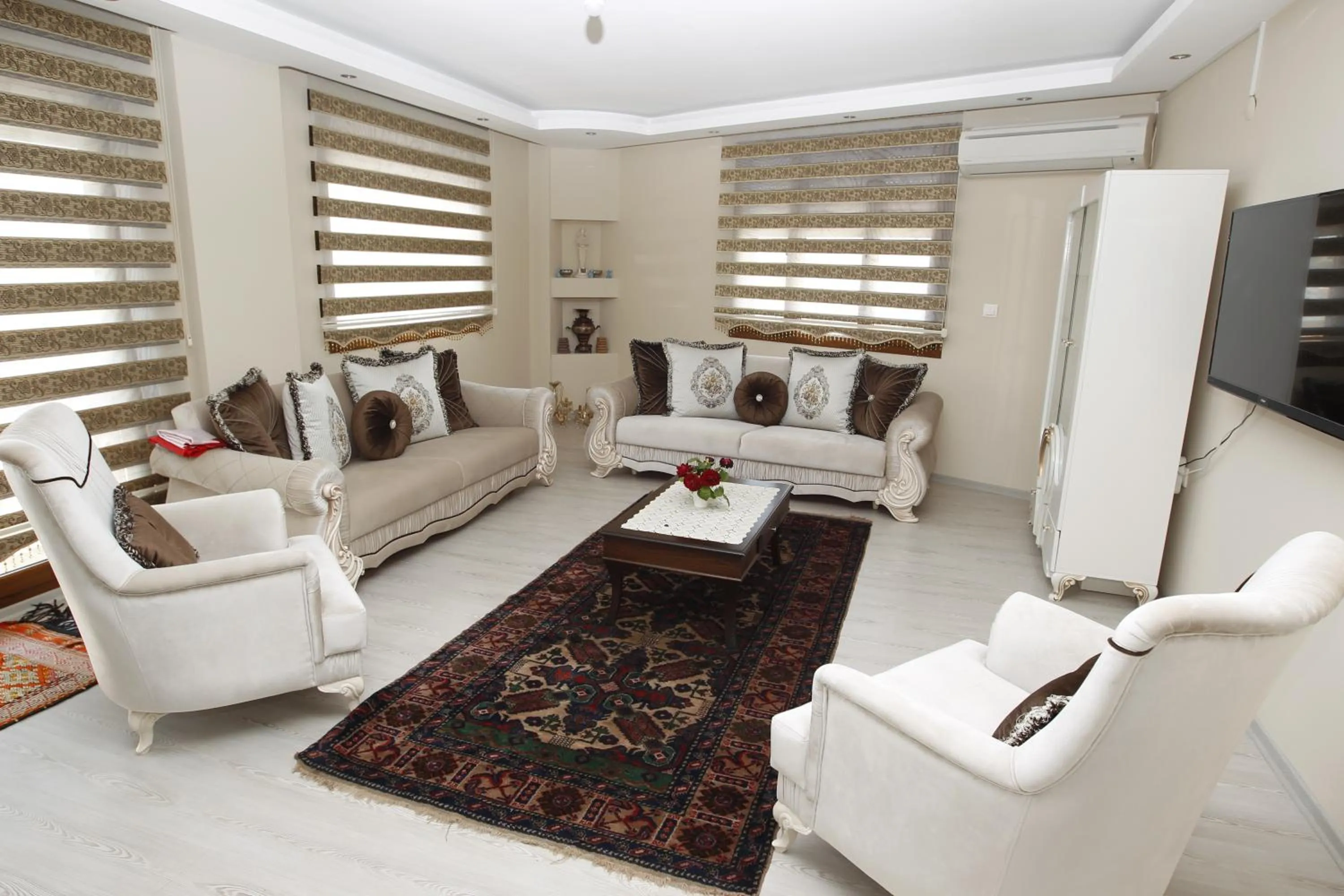 Communal lounge/ TV room in Ephesus Palace