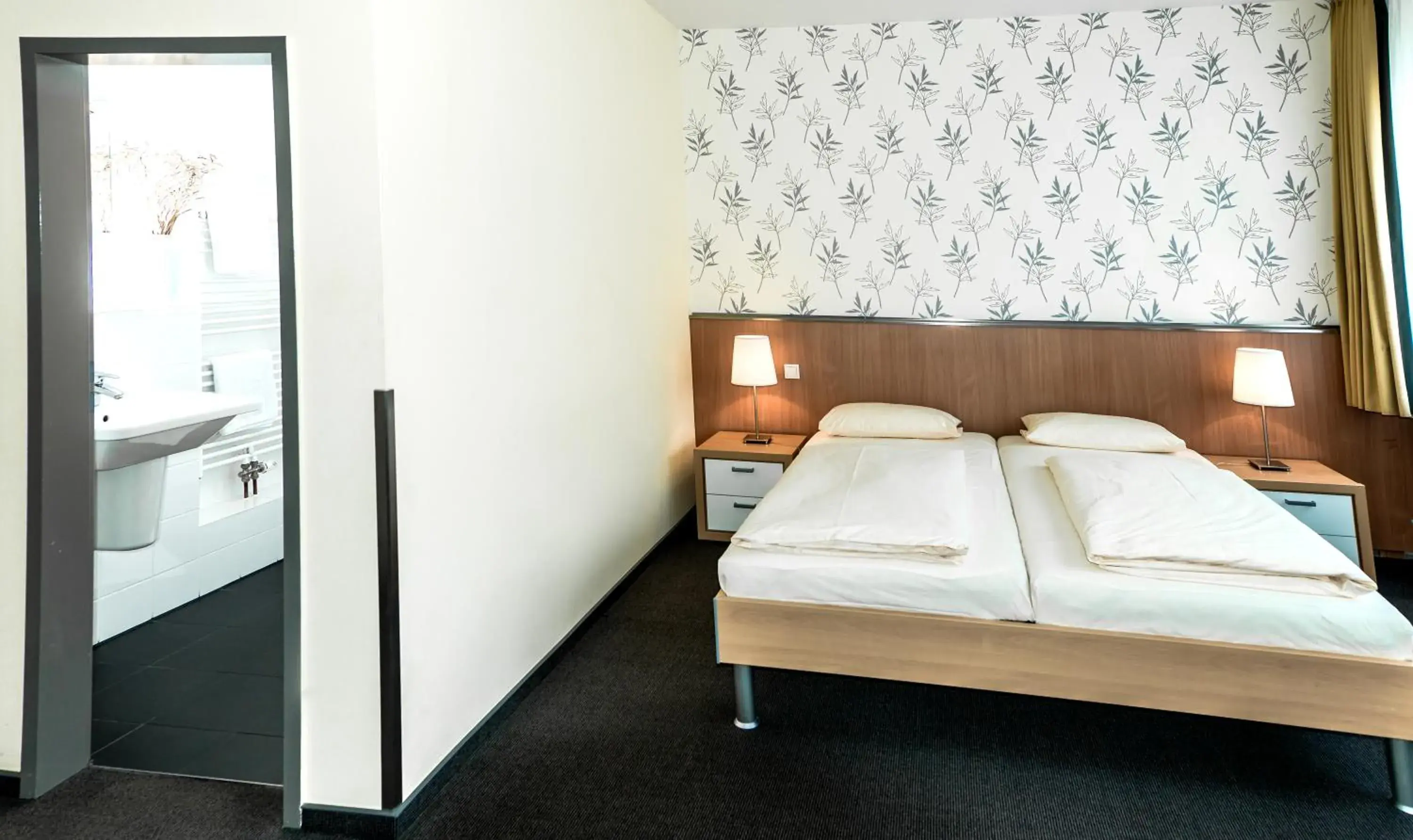 Photo of the whole room, Bed in Hotel Flämischer Hof Photo of the whole room, Bed in Hotel Flämischer Hof