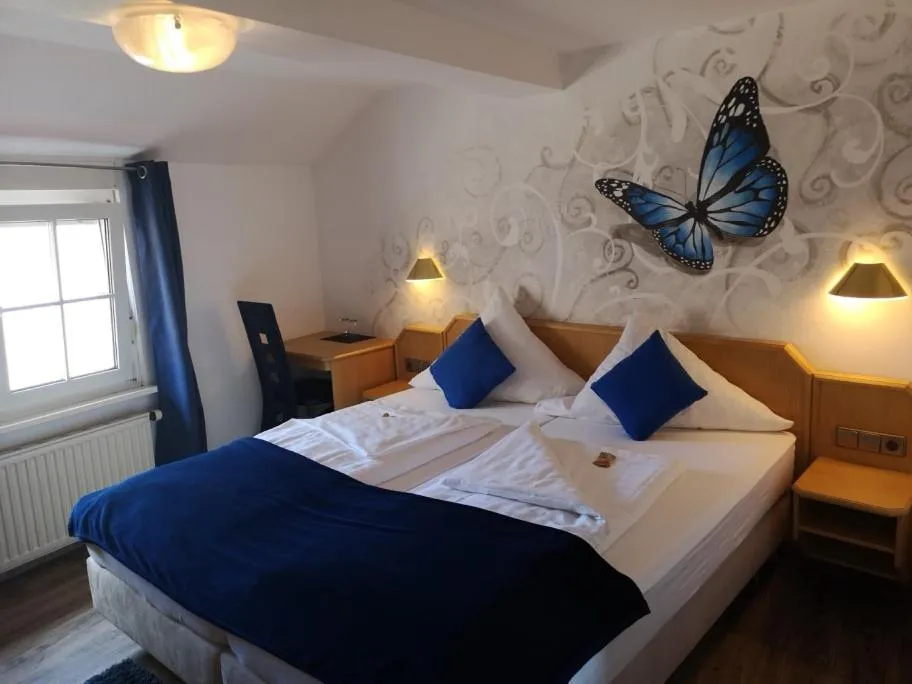 Bed in Hotel DreiKönig & Restaurant SeeGourmet