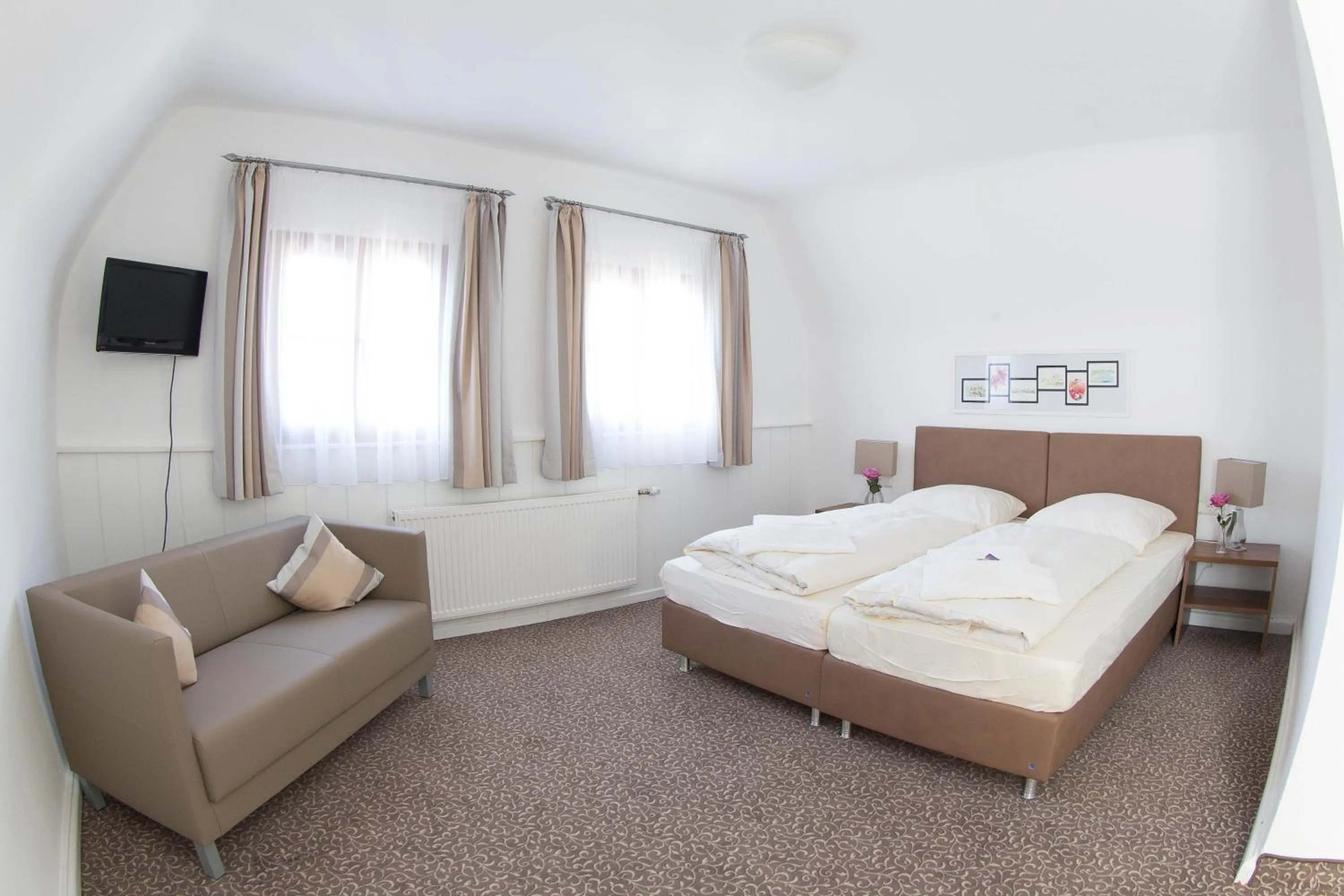 Photo of the whole room, Bed in Boutiquehotel Goldene Rose - self-check-in