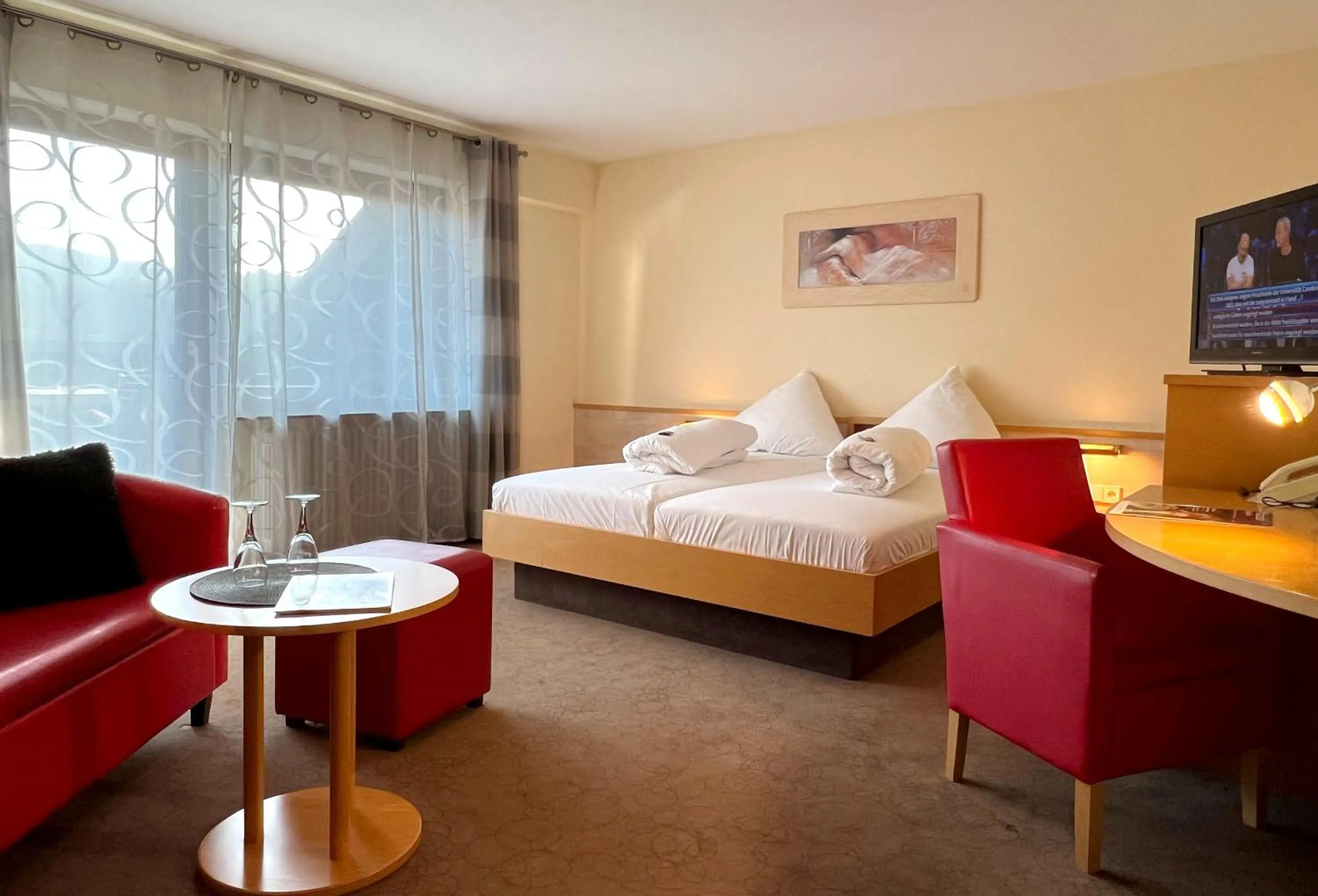 Photo of the whole room, Bed in Hotel Am Hirschhorn - Wellness - Spa - and more