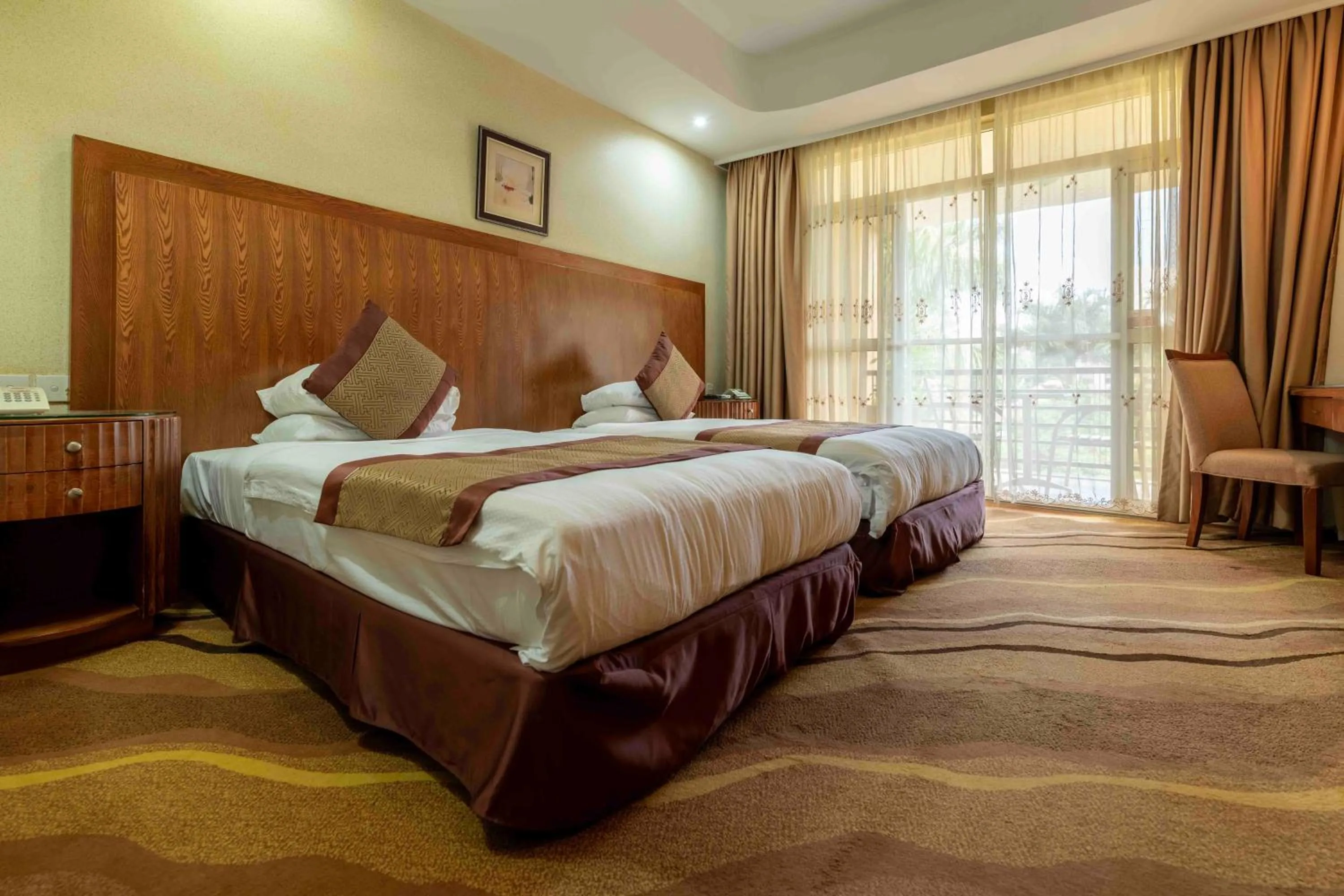 Bed in Mbale Resort Hotel
