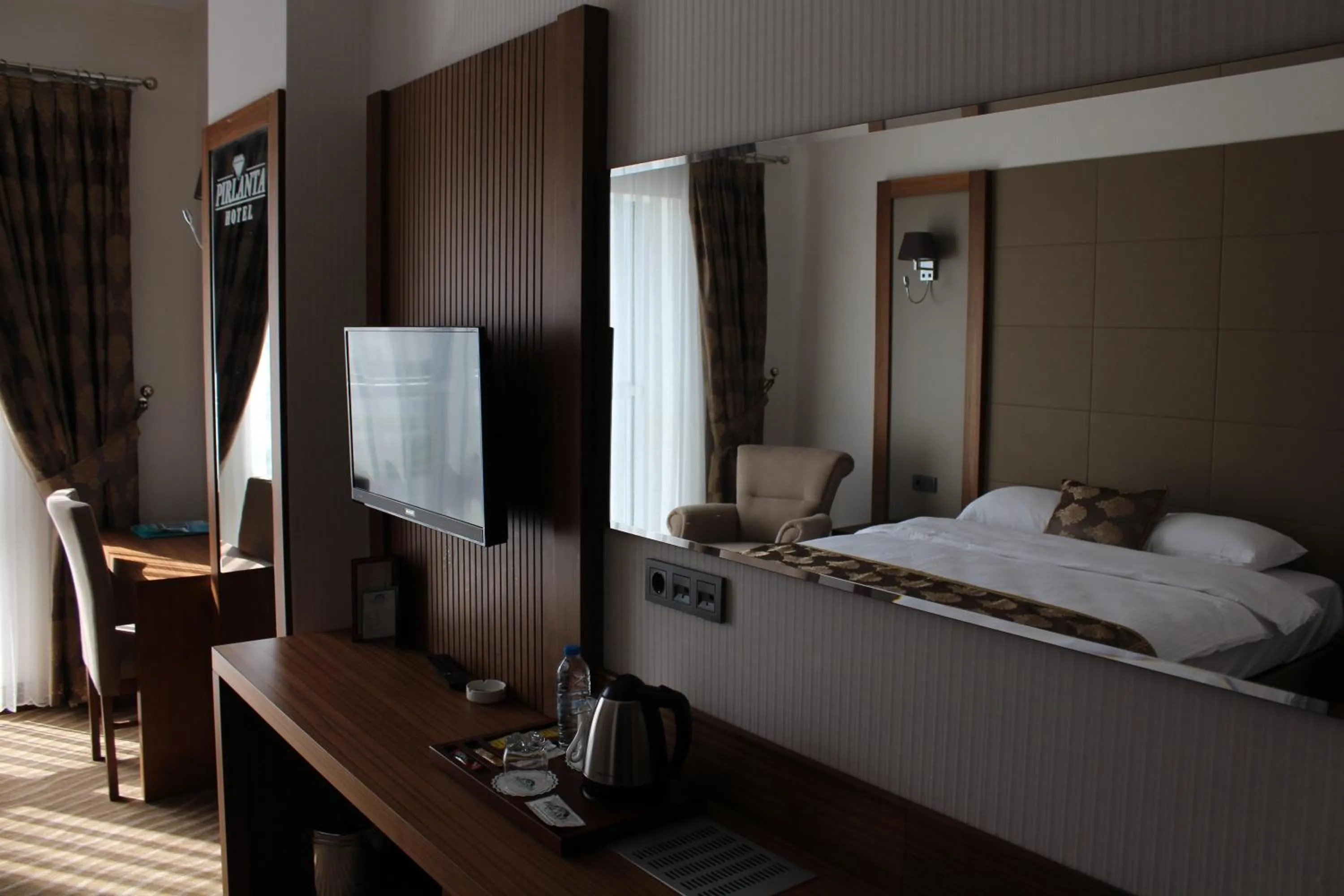 Bed in YZE Pırlanta Hotel