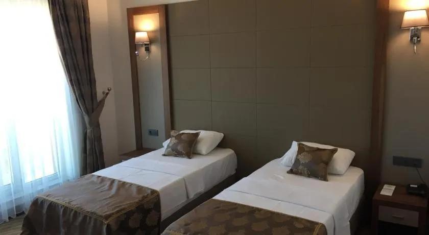 Bed in YZE Pırlanta Hotel