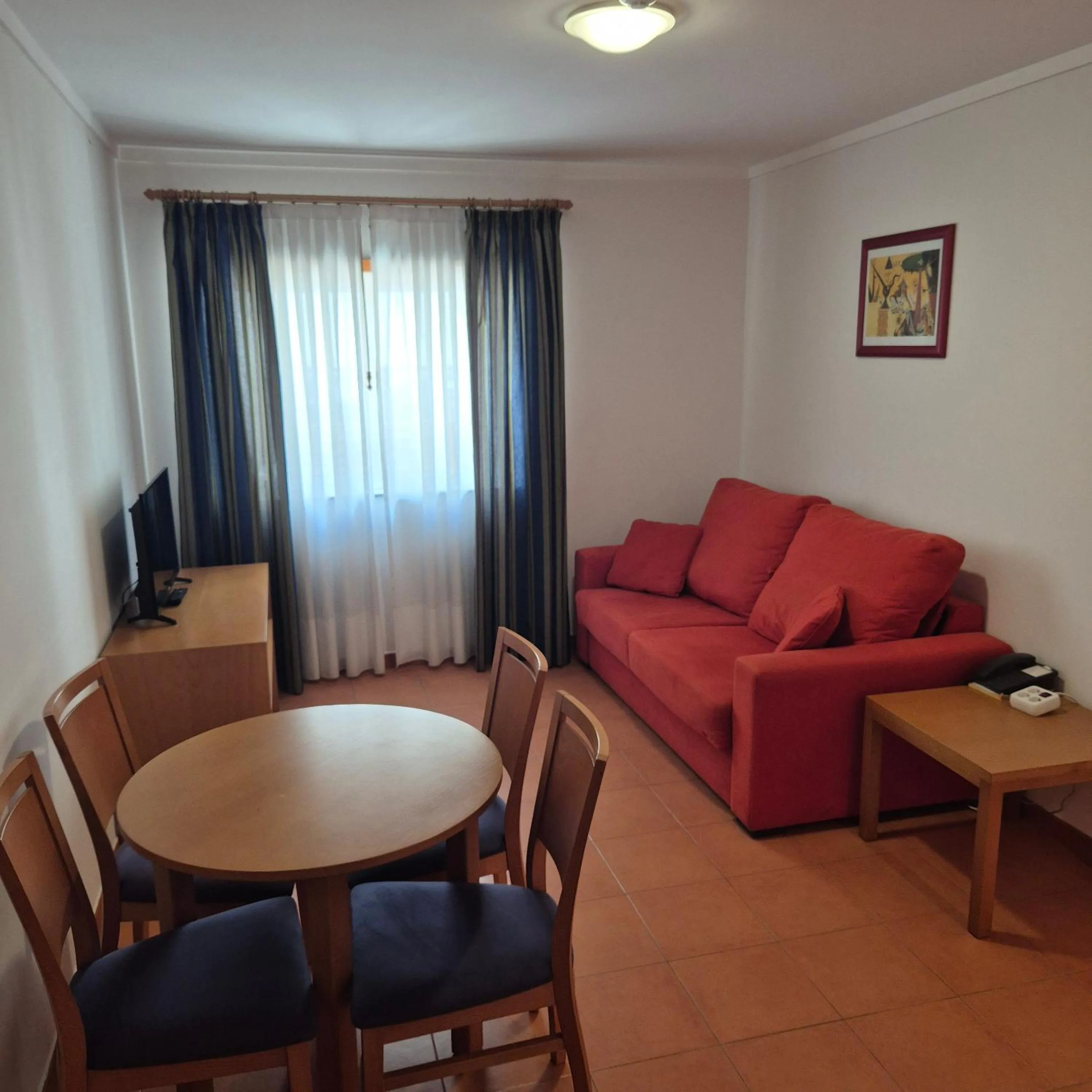 TV and multimedia in Apartamentos Turísticos Vila Praia