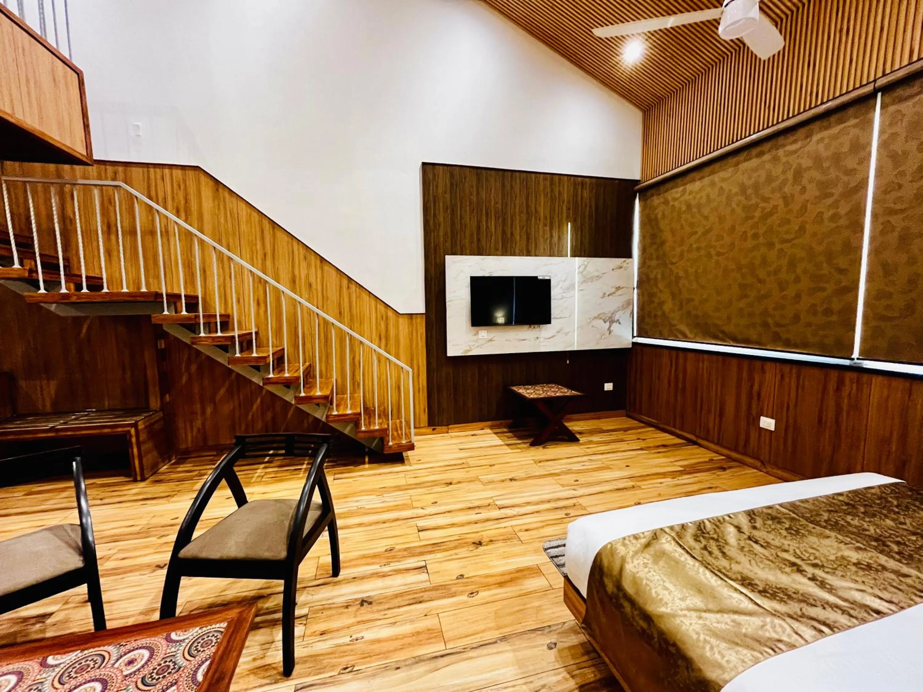 Living room, Bed in Hotel The Onix