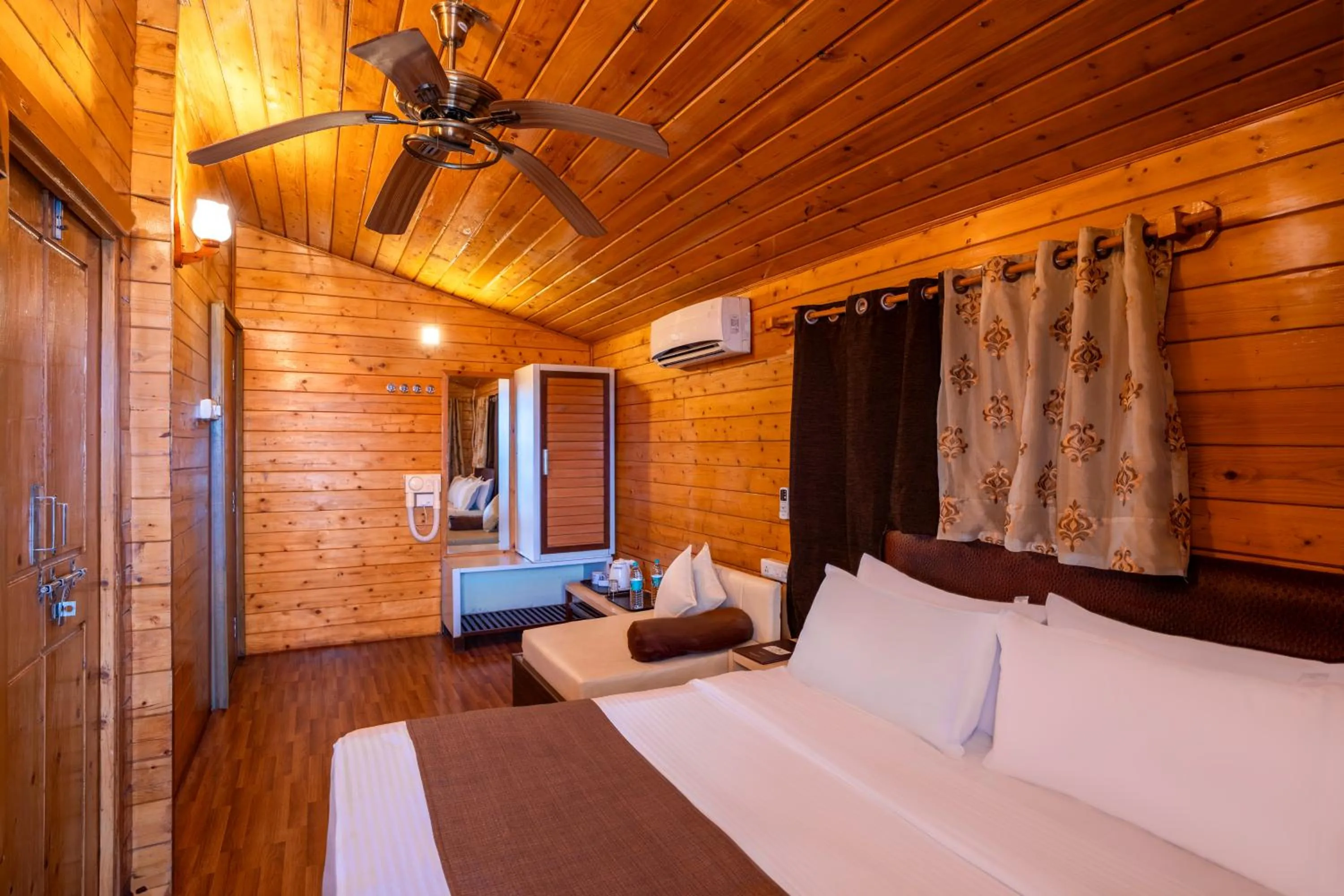 Bedroom, Bed in The Grand Legacy Resort & Spa - TGL - Pure Vegetarian Mahabaleshwar