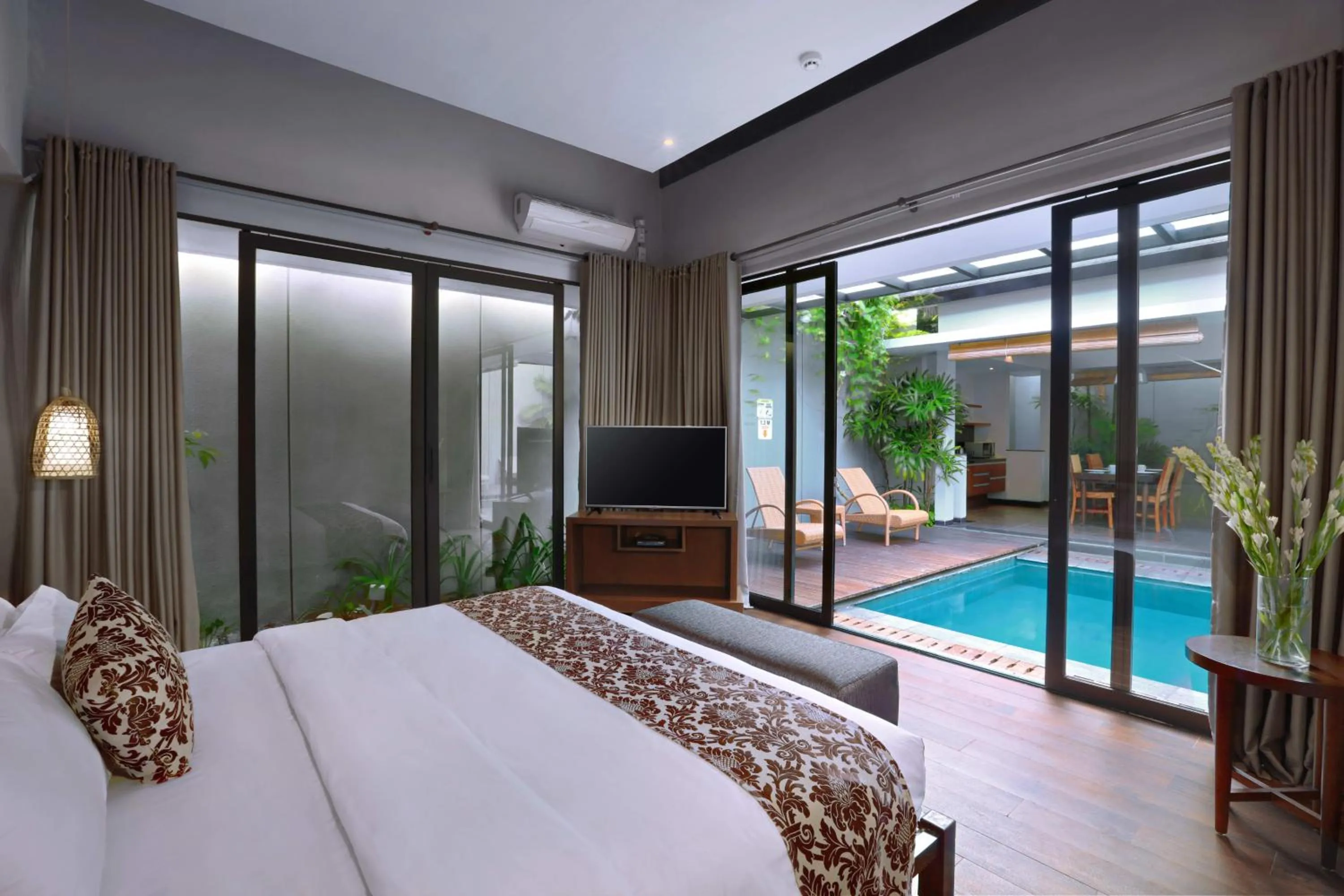 Bed in Kamuela Villa Lagoi Bay Bintan