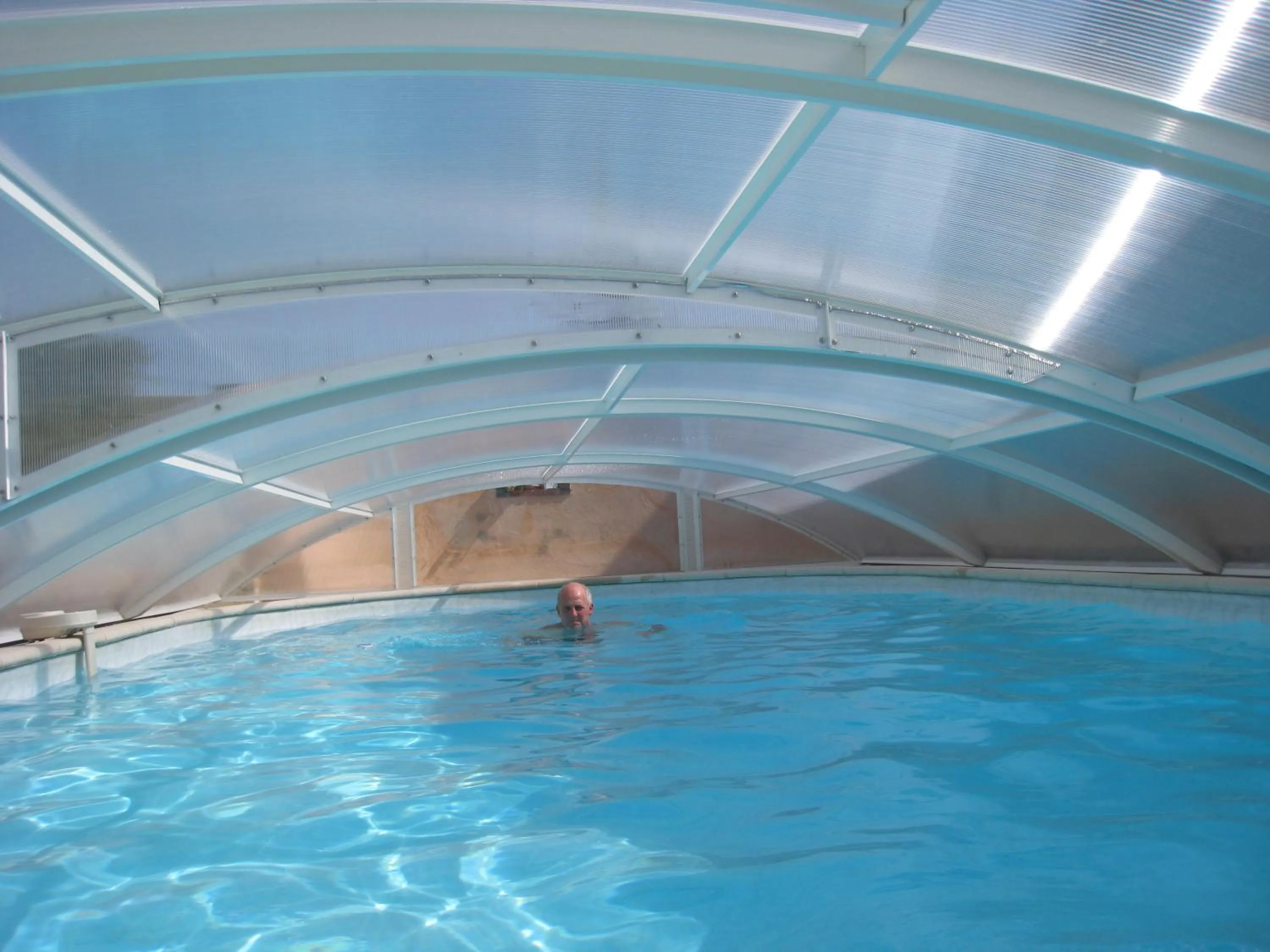 Swimming pool in La Chambre D'amis LA COSTIGNIERES