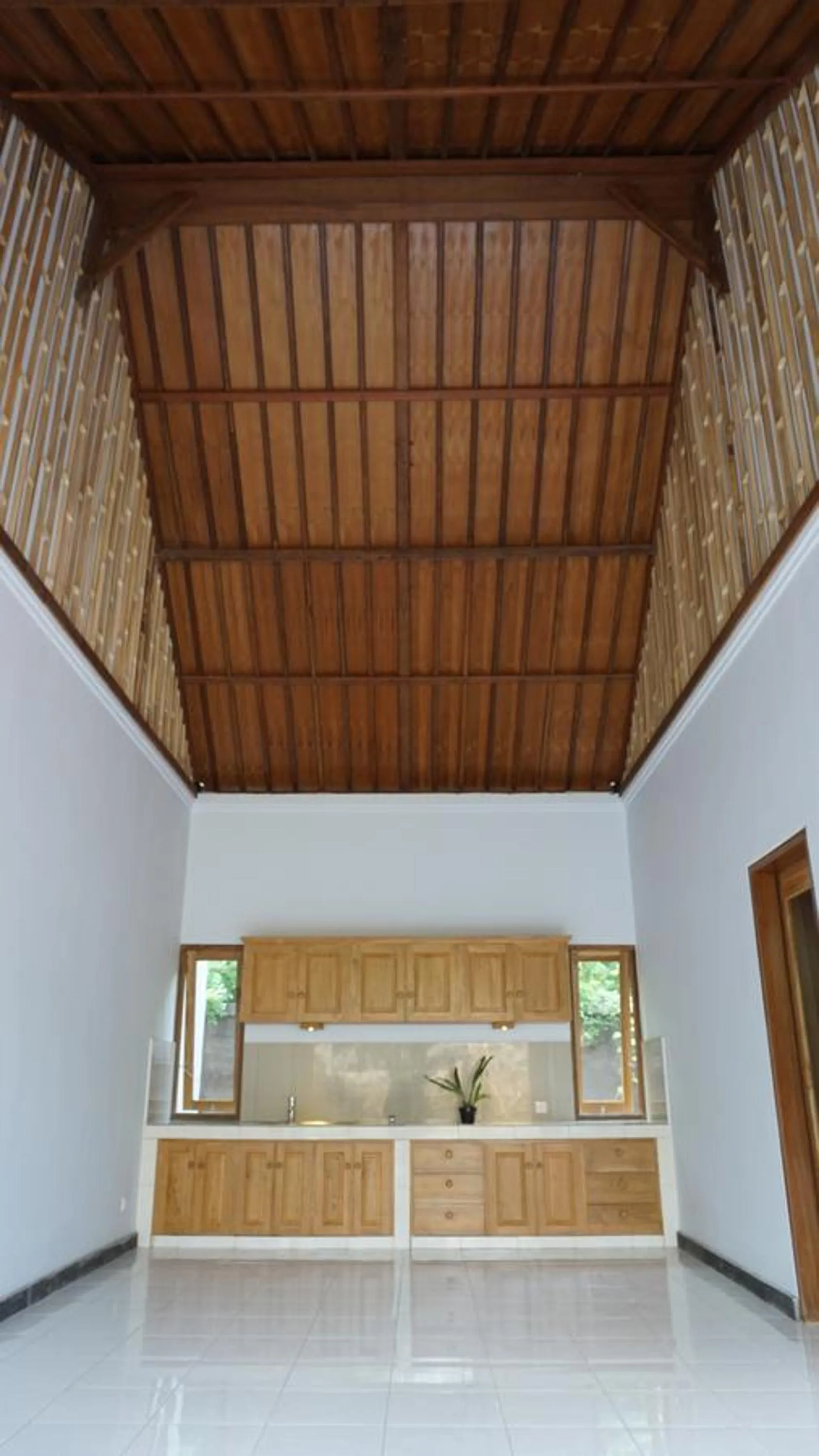 Kitchen or kitchenette, Bed in Biorock Homestay & Dive Center Pemuteran