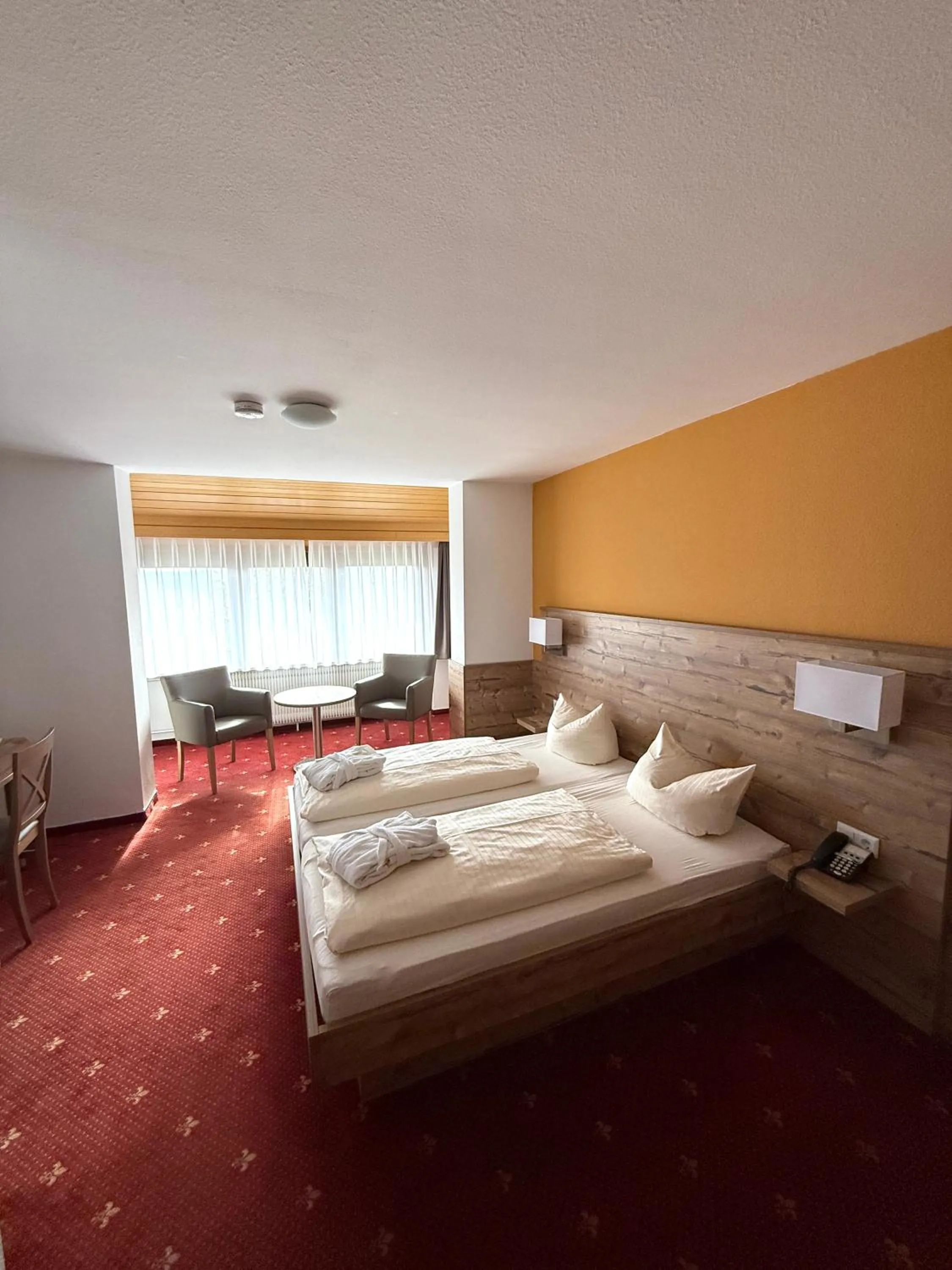 Photo of the whole room, Bed in Hotel Traube Lossburg