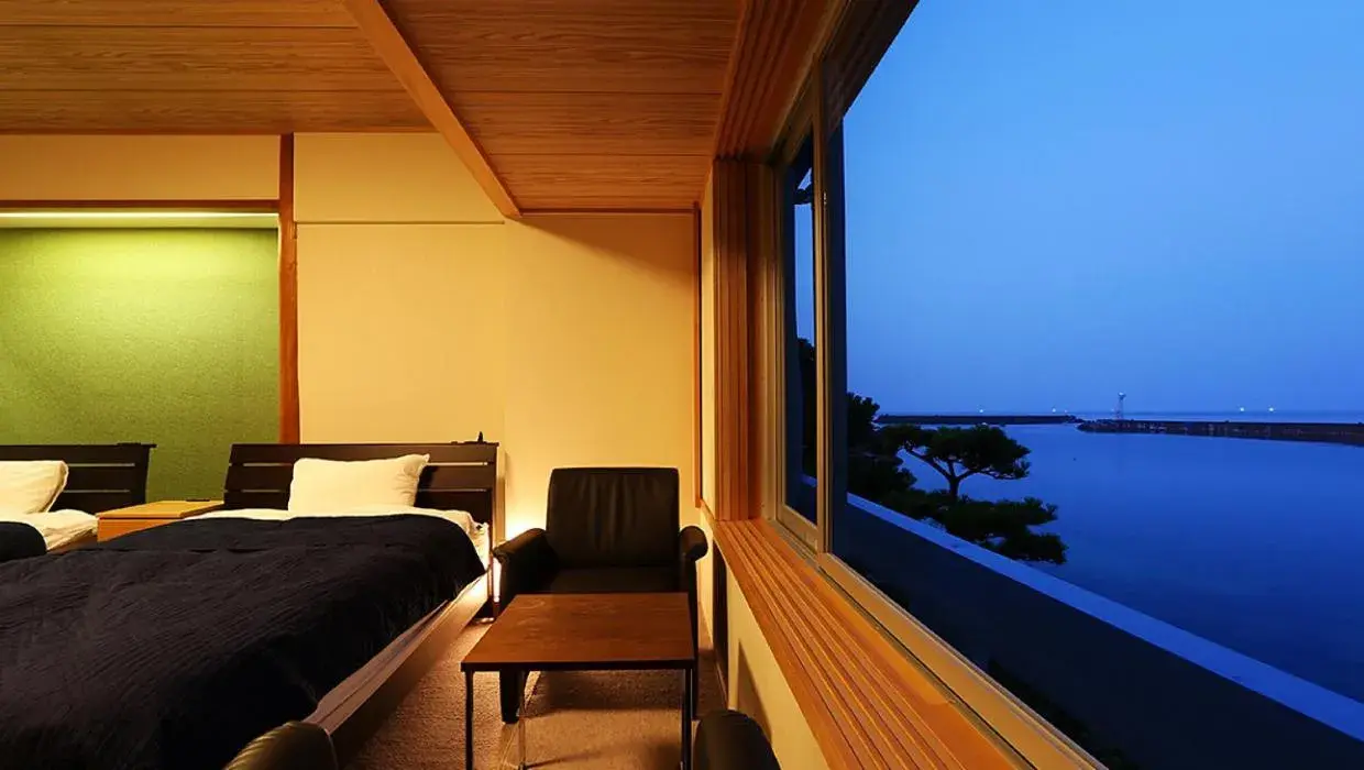 Bed in Okukinosaki Seaside Hotel Bed in Okukinosaki Seaside Hotel