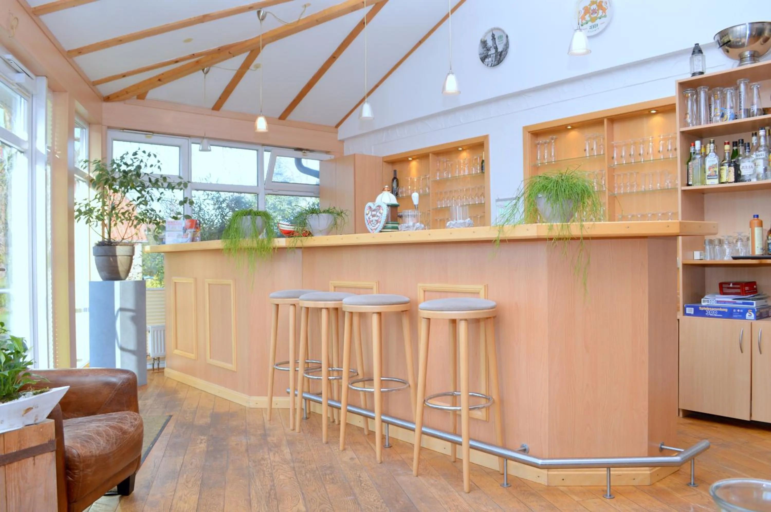 Communal lounge/ TV room in Hotel Herrlichkeit Dornum Janßen