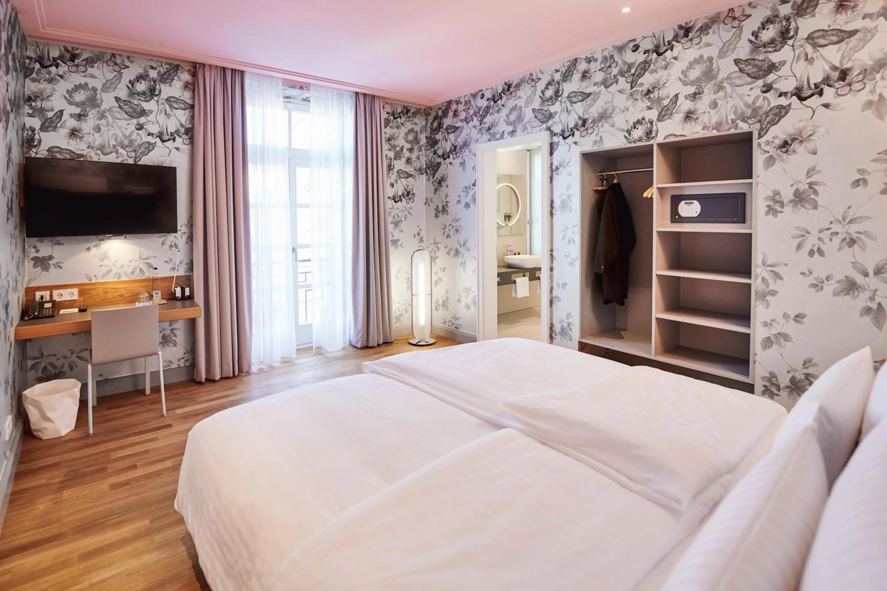 Bed in MOMA1890 Boutique Hotel