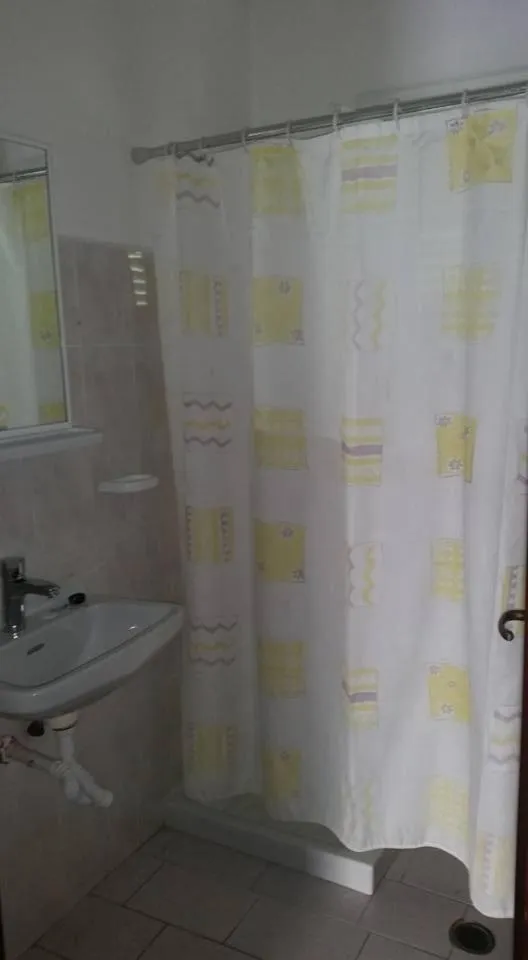 Bathroom in Alexandros Studios Apartments