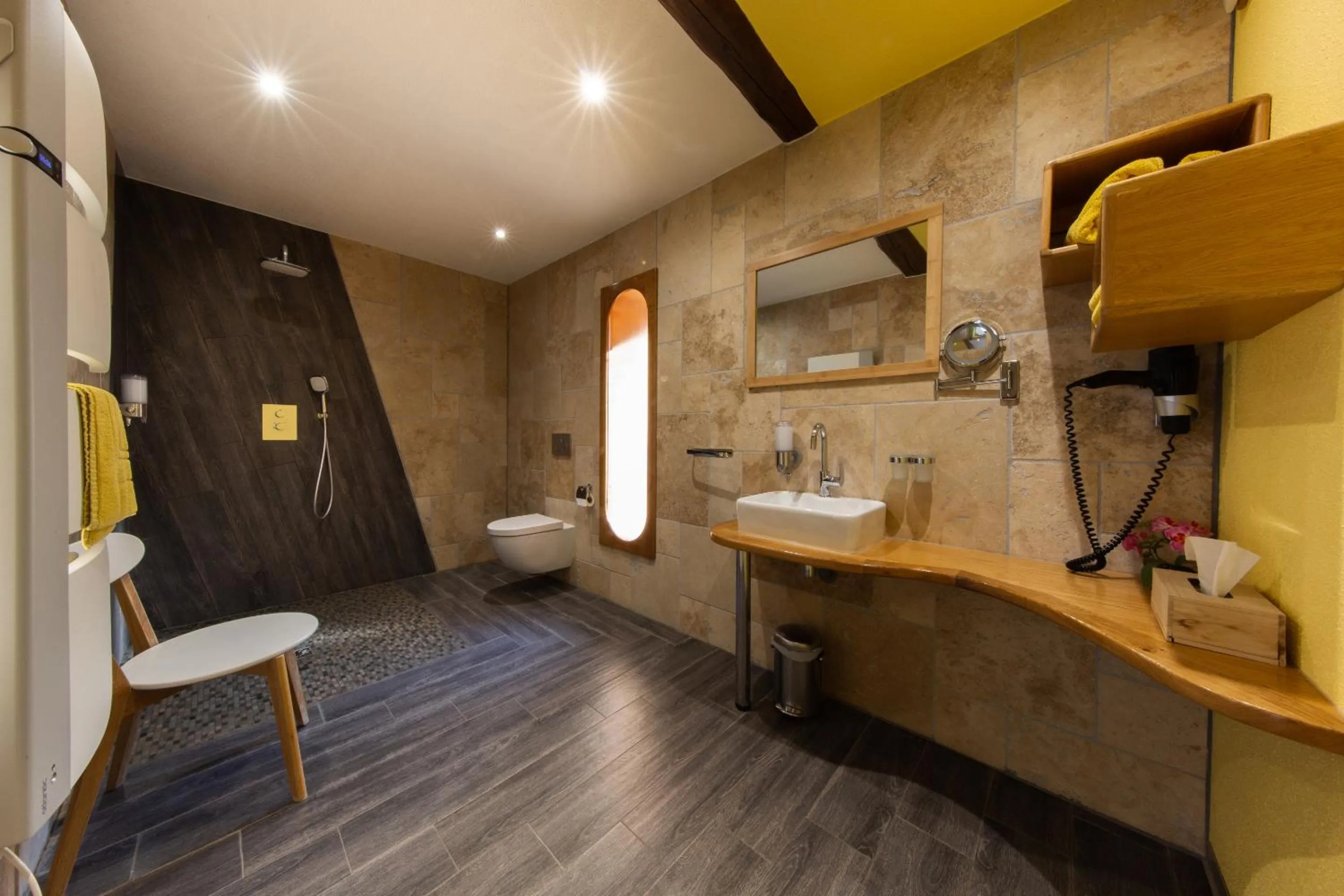 Bathroom in Le Domaine du Verger gîtes et SPA