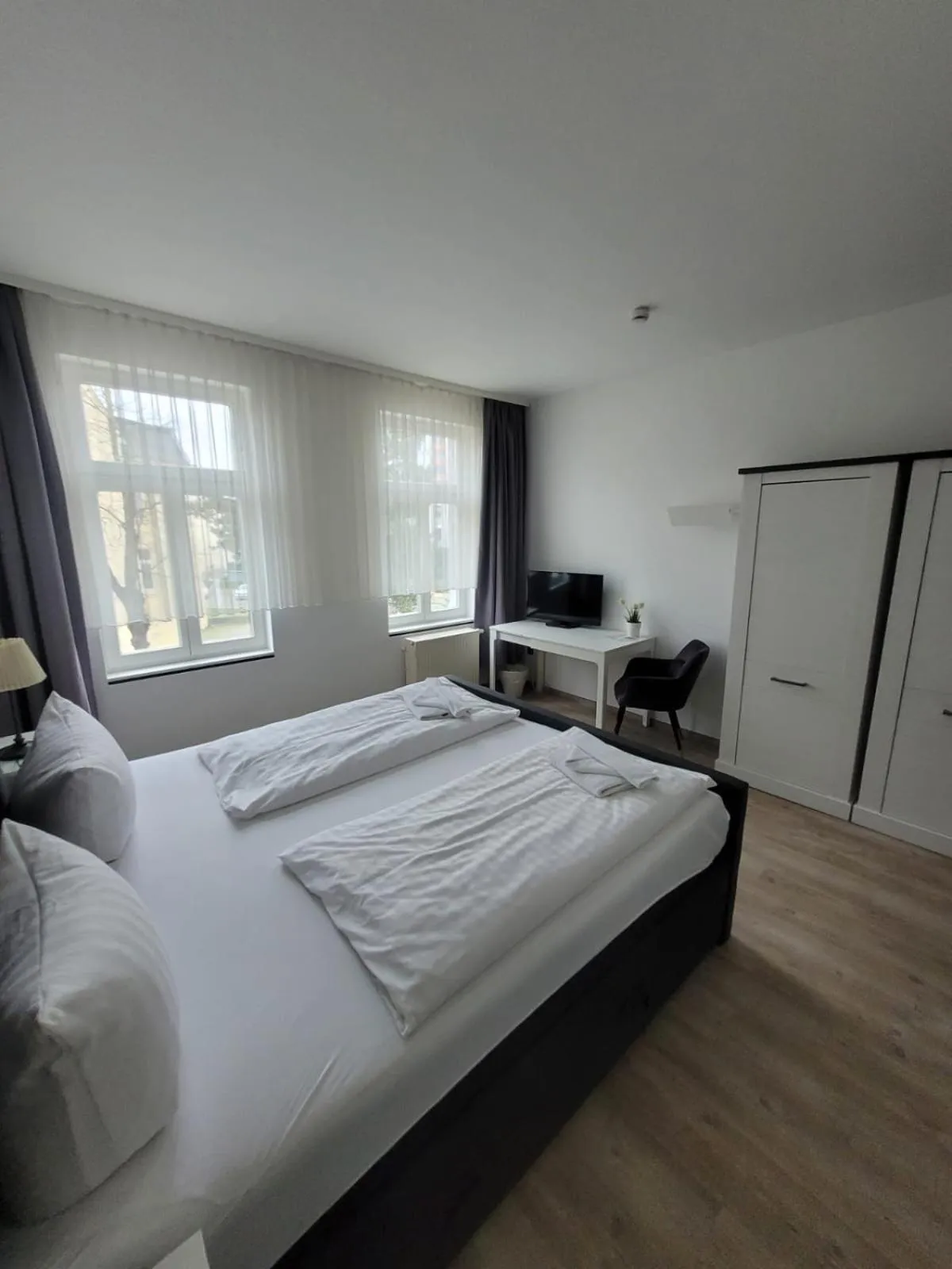 Bed in Appartement-Hotel Rostock