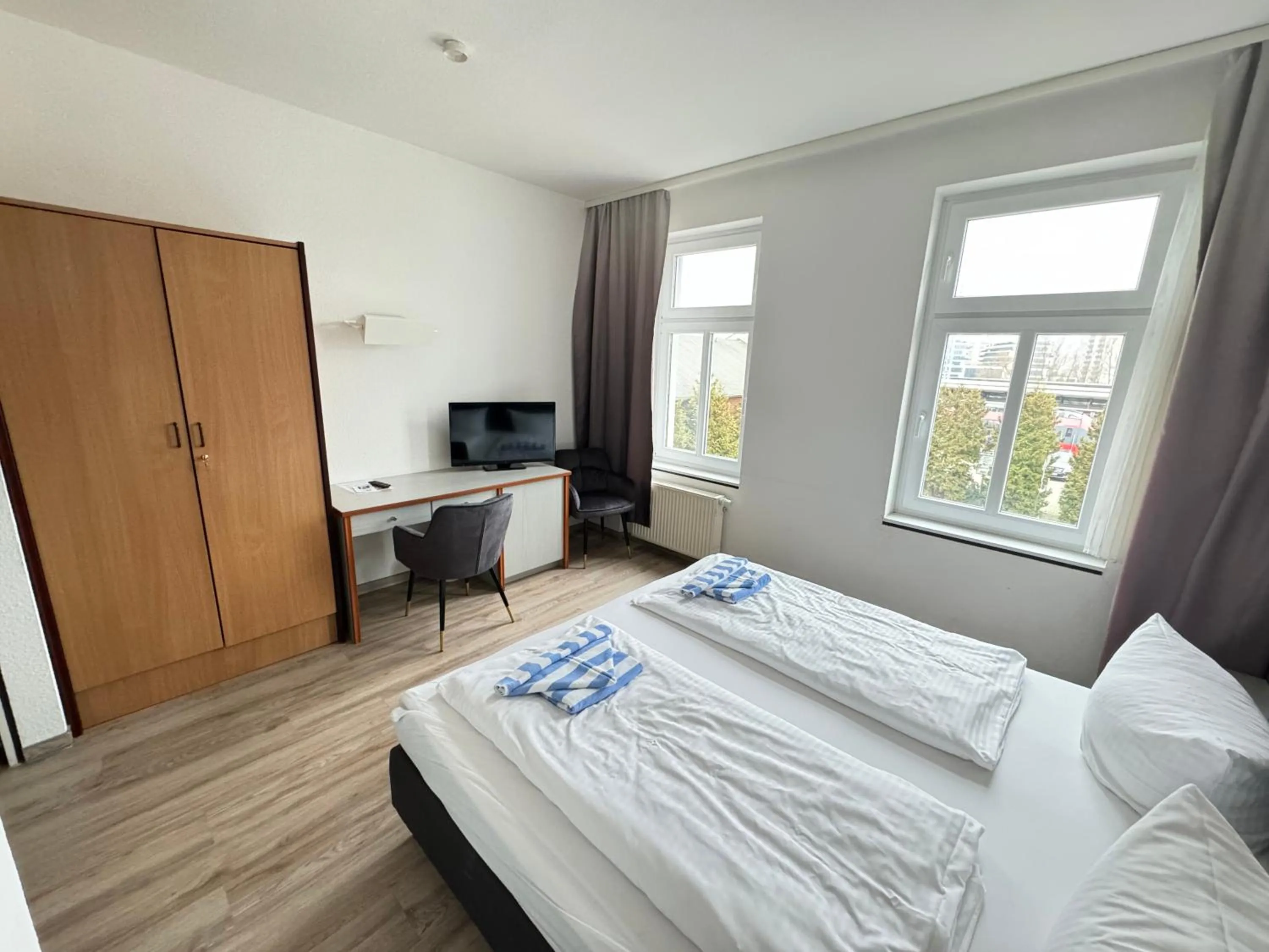 Bed in Appartement-Hotel Rostock