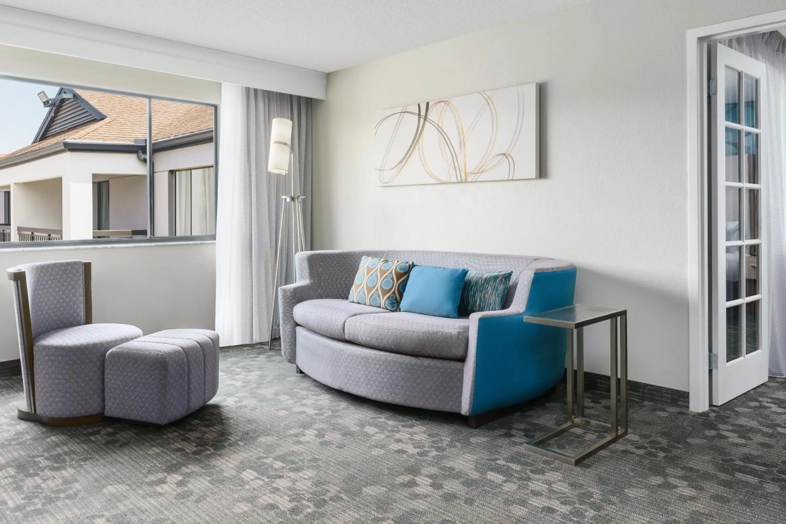 Living room in Courtyard by Marriott Orlando Lake Buena Vista at Vista Centre