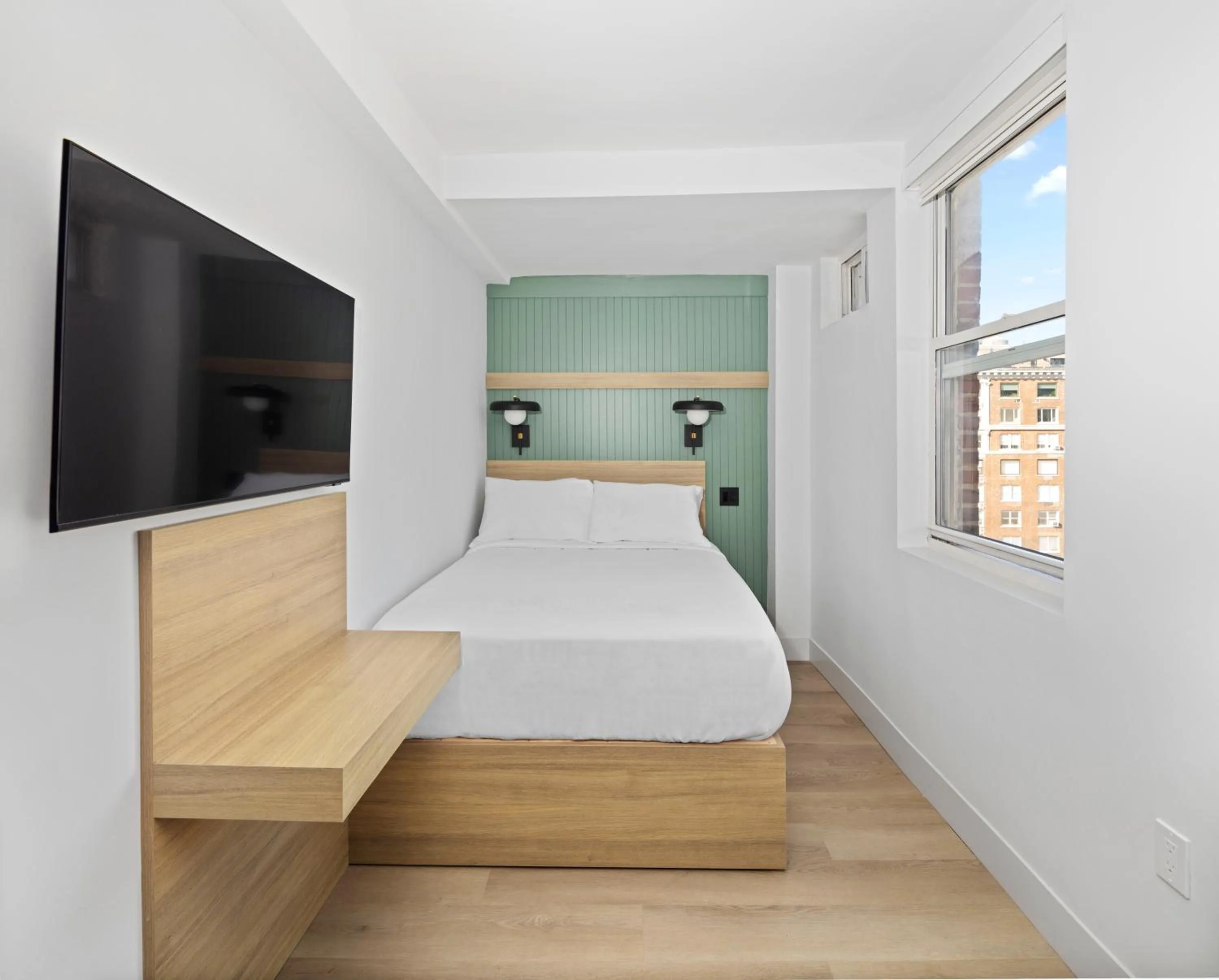 Bed in Riverside Tower Hotel