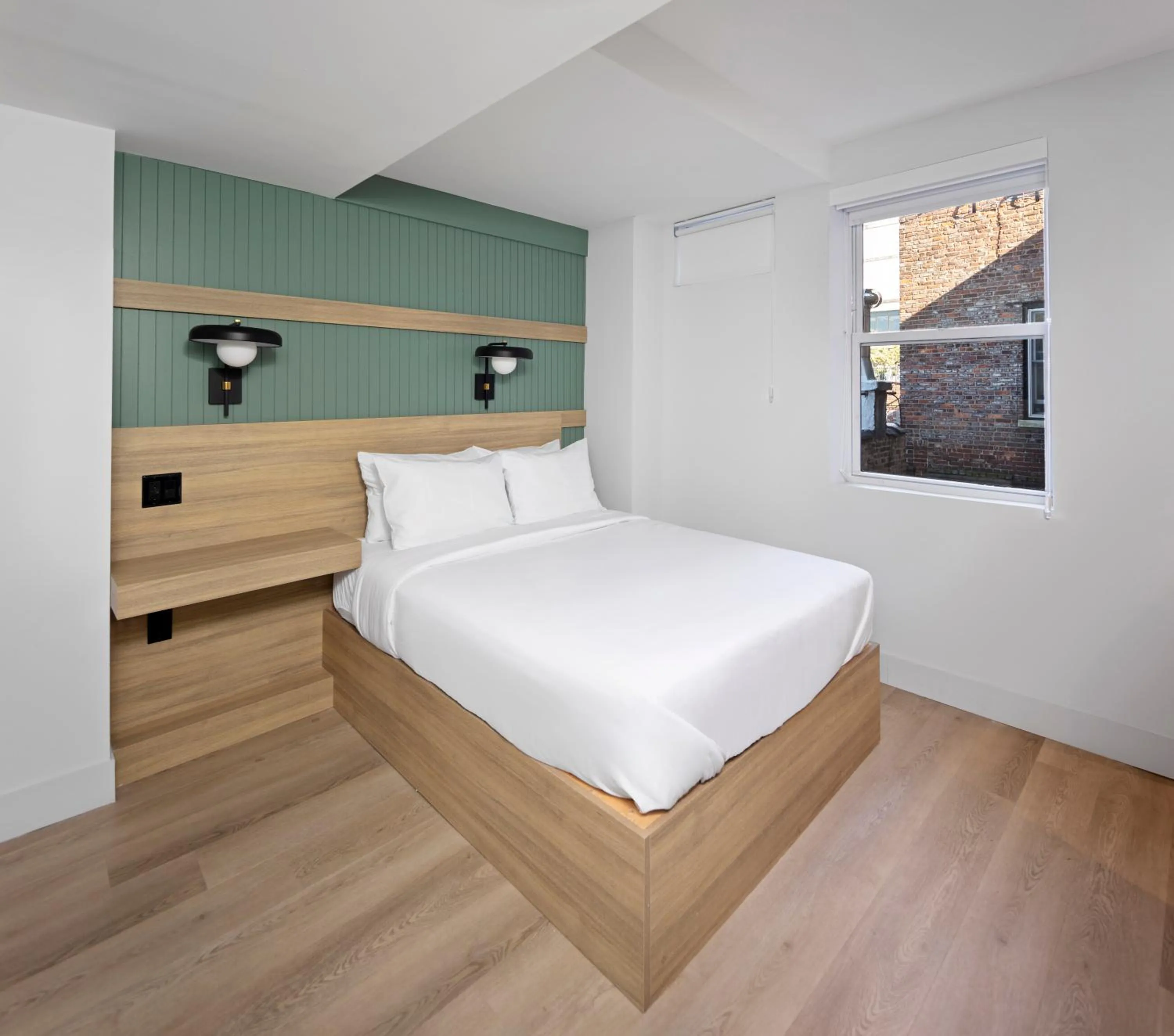 Bed in Riverside Tower Hotel