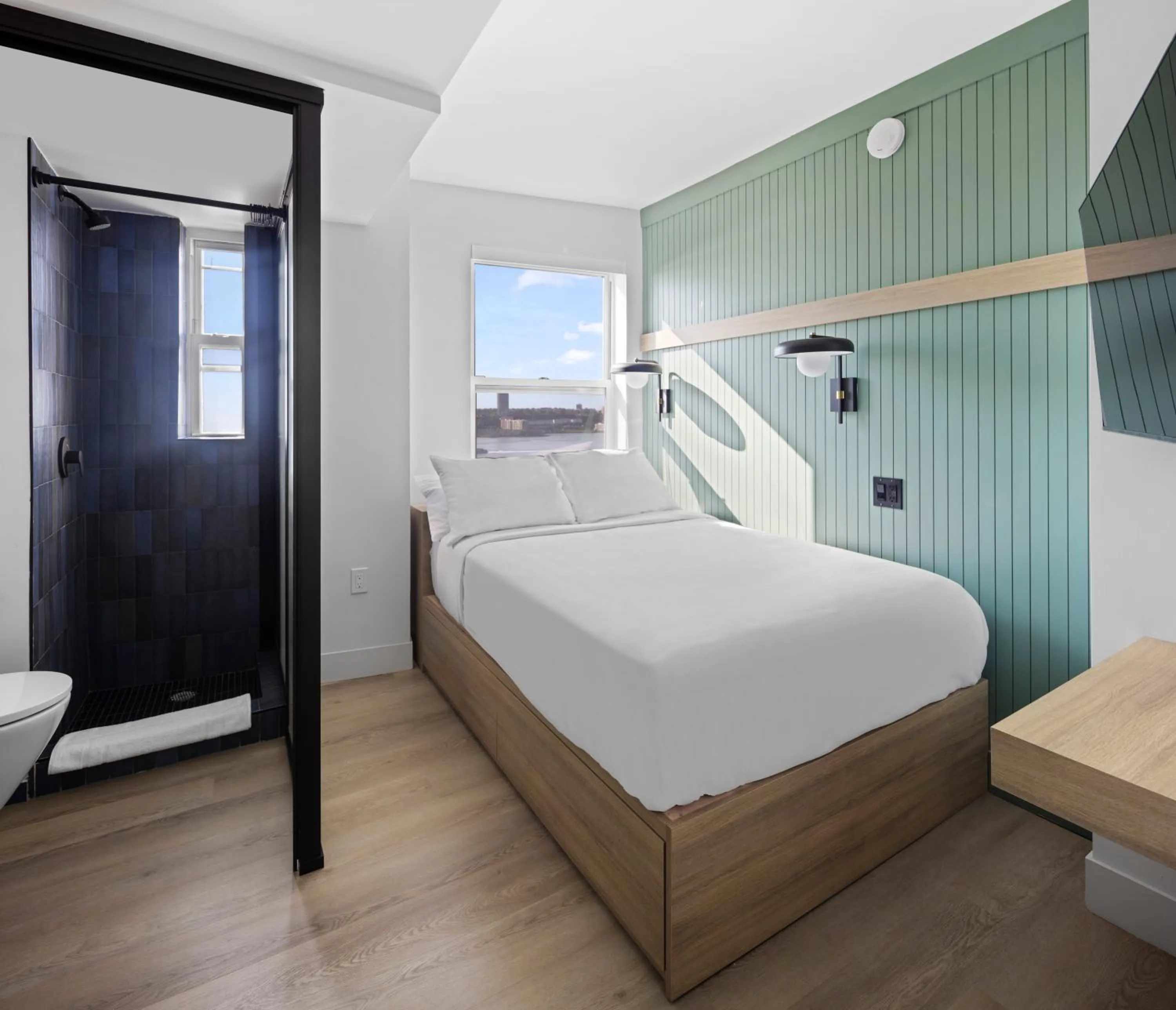 Bed in Riverside Tower Hotel