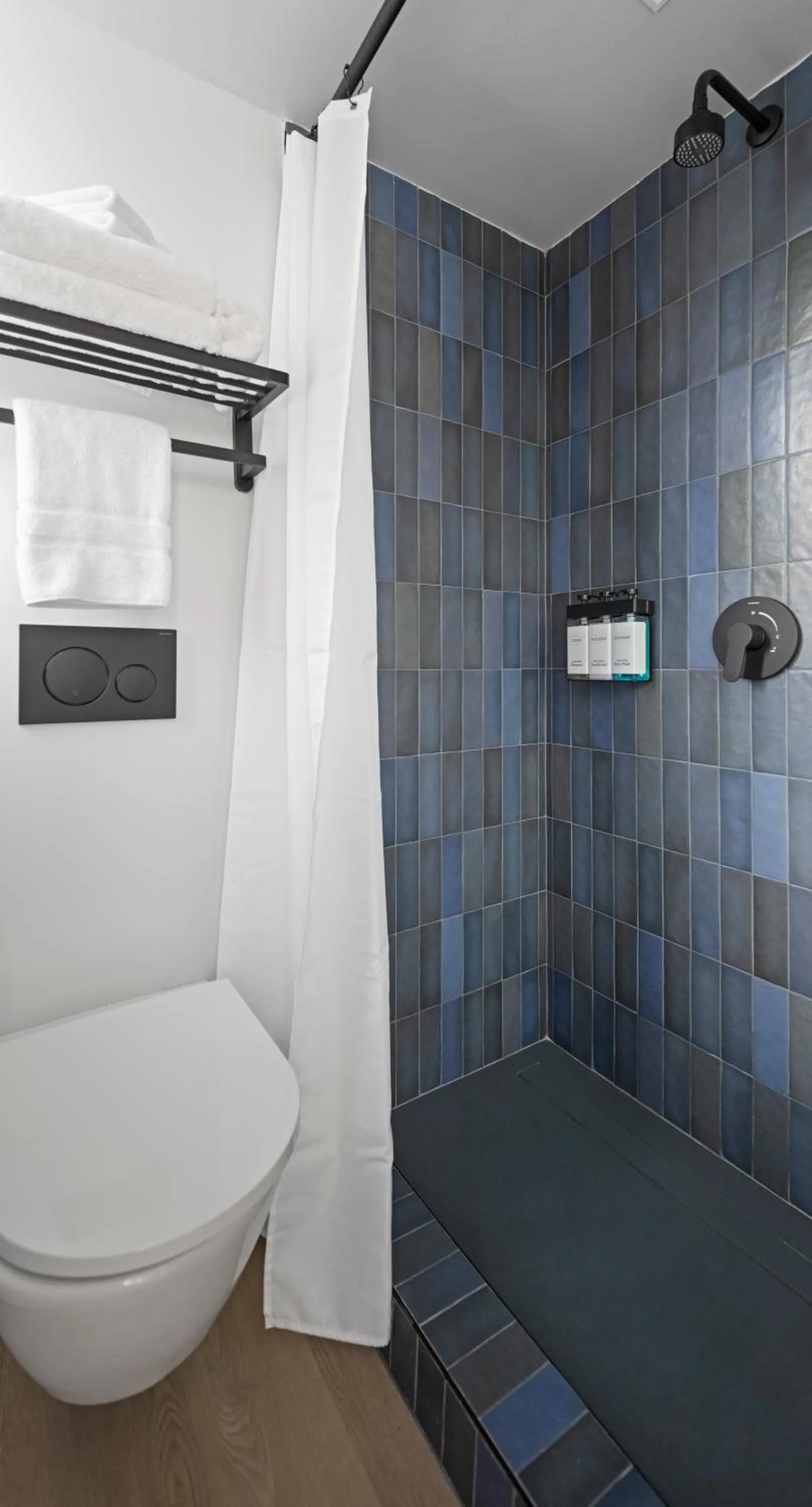 Shower in Riverside Tower Hotel