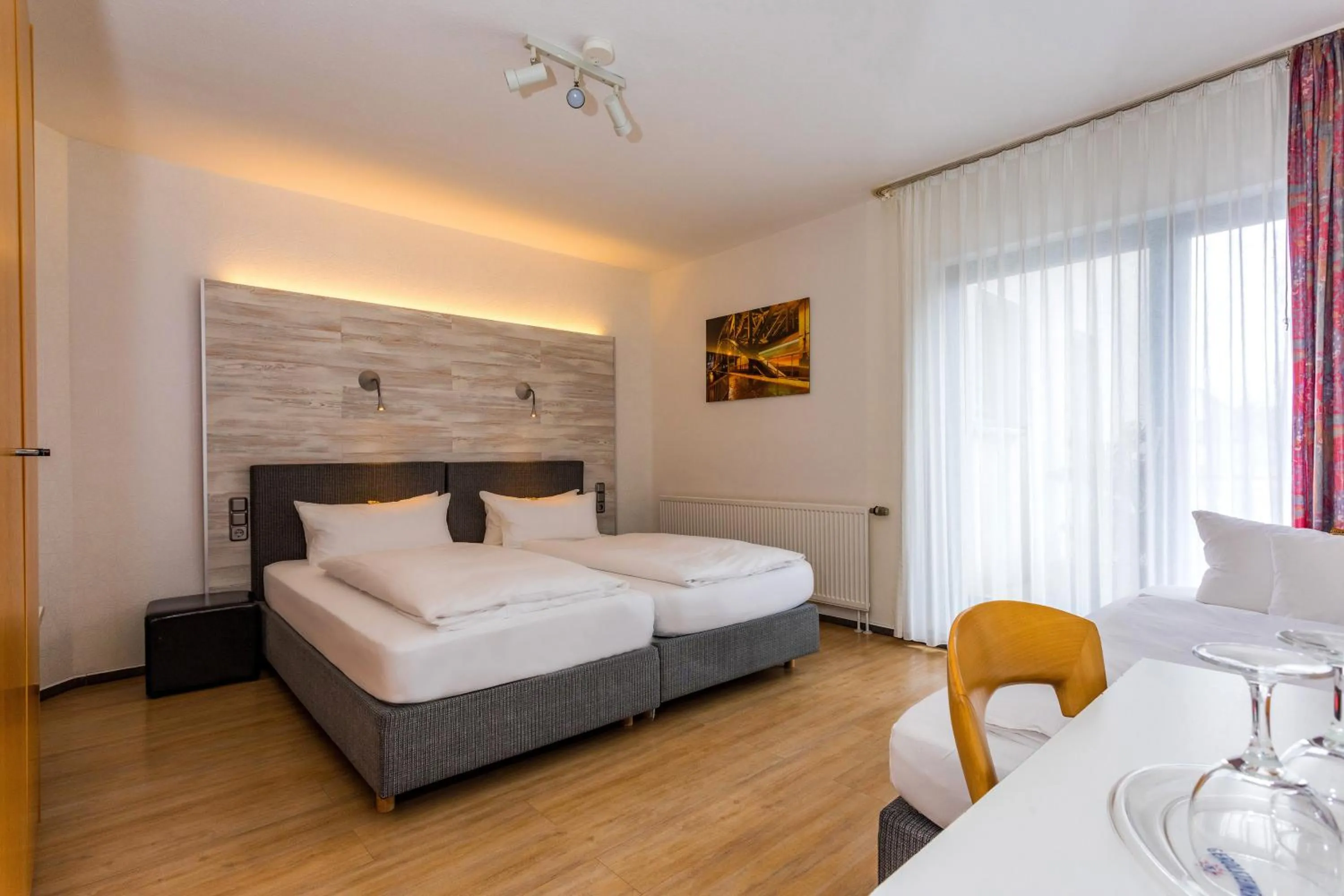 Photo of the whole room, Bed in Hotel & Wirtshaus Hansen