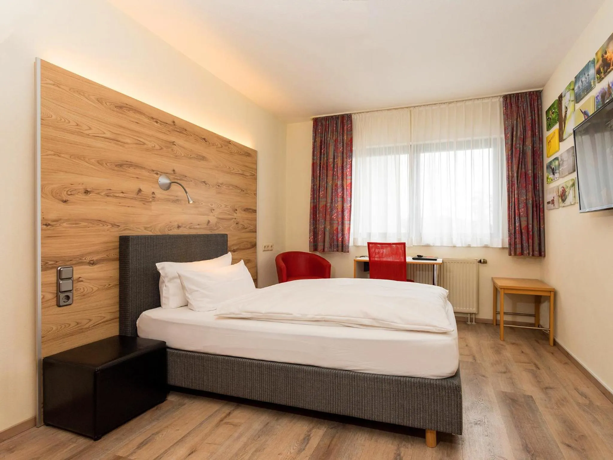 Photo of the whole room, Bed in Hotel & Wirtshaus Hansen