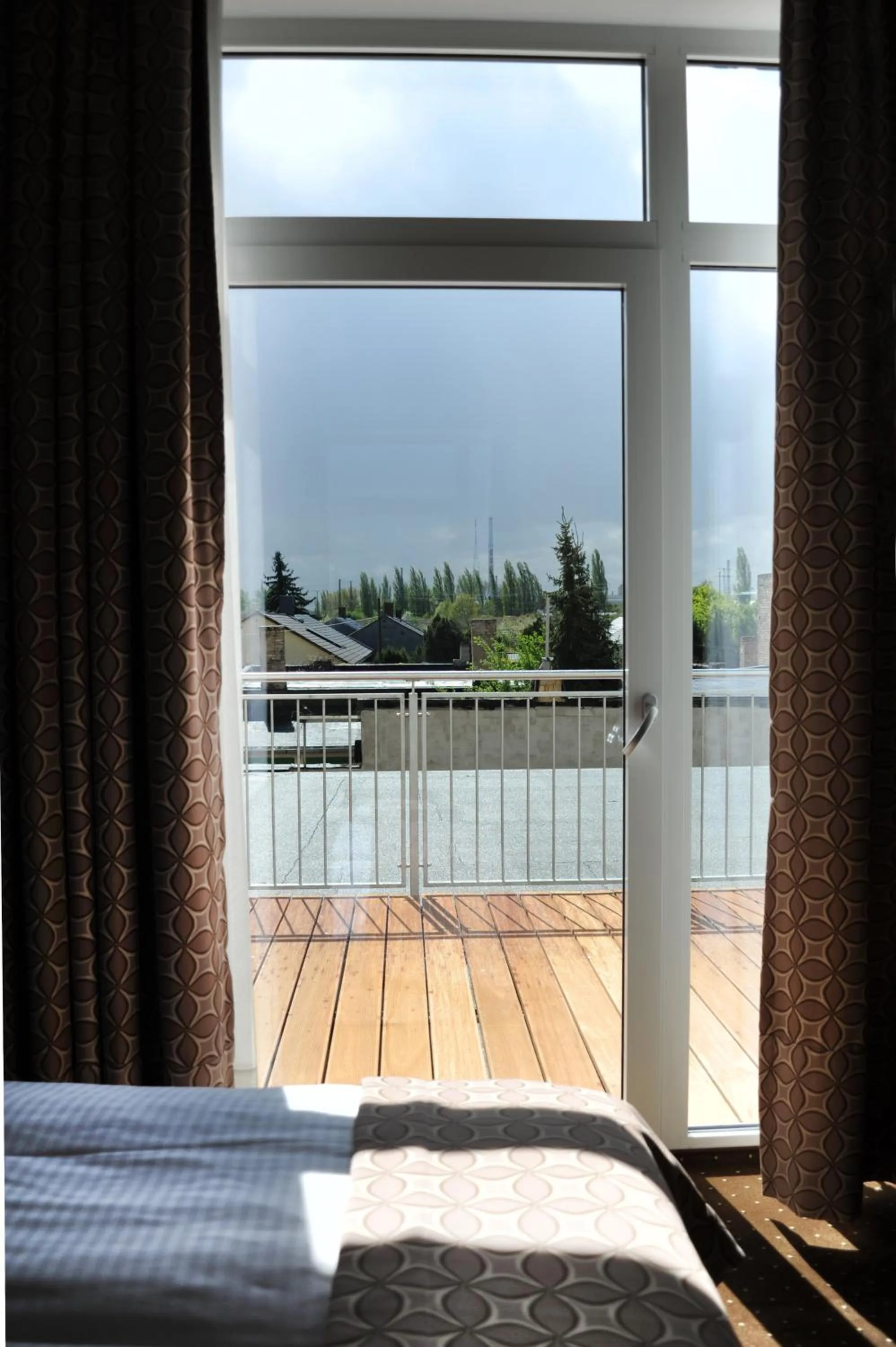 View (from property/room), Bed in Hotel Atlas Halle