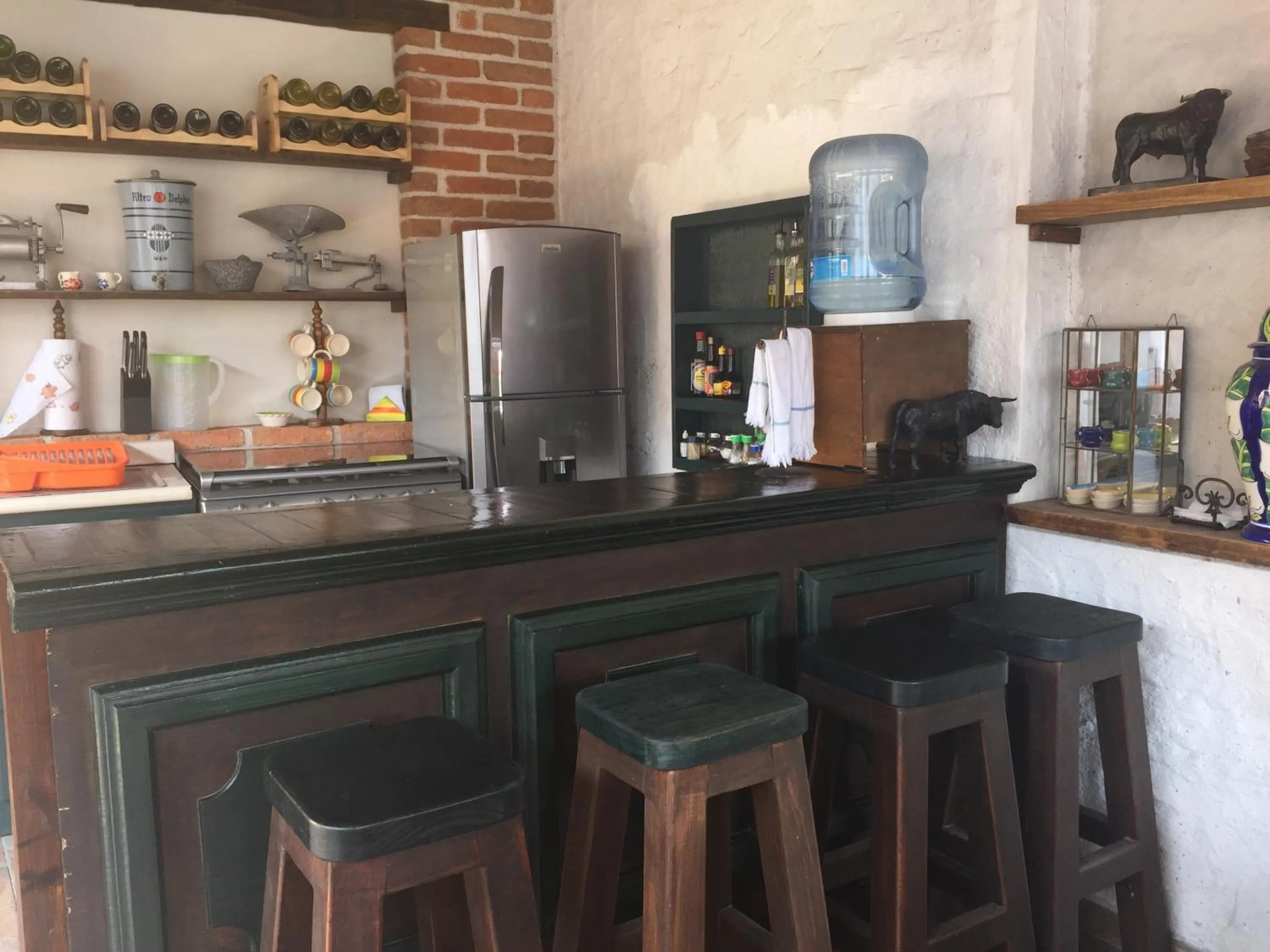 Kitchen or kitchenette in Suites colibri