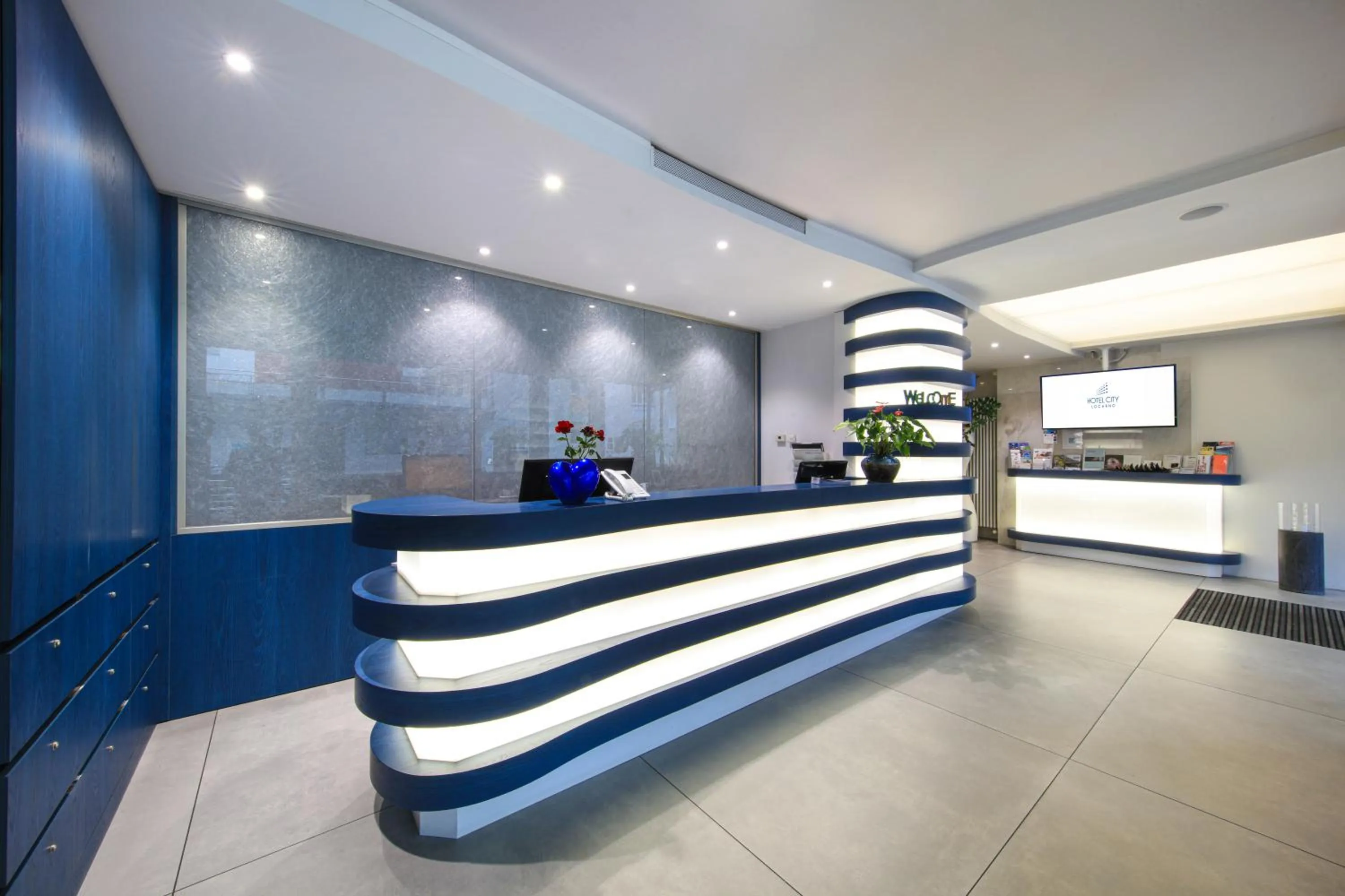 Lobby or reception in Hotel City Locarno