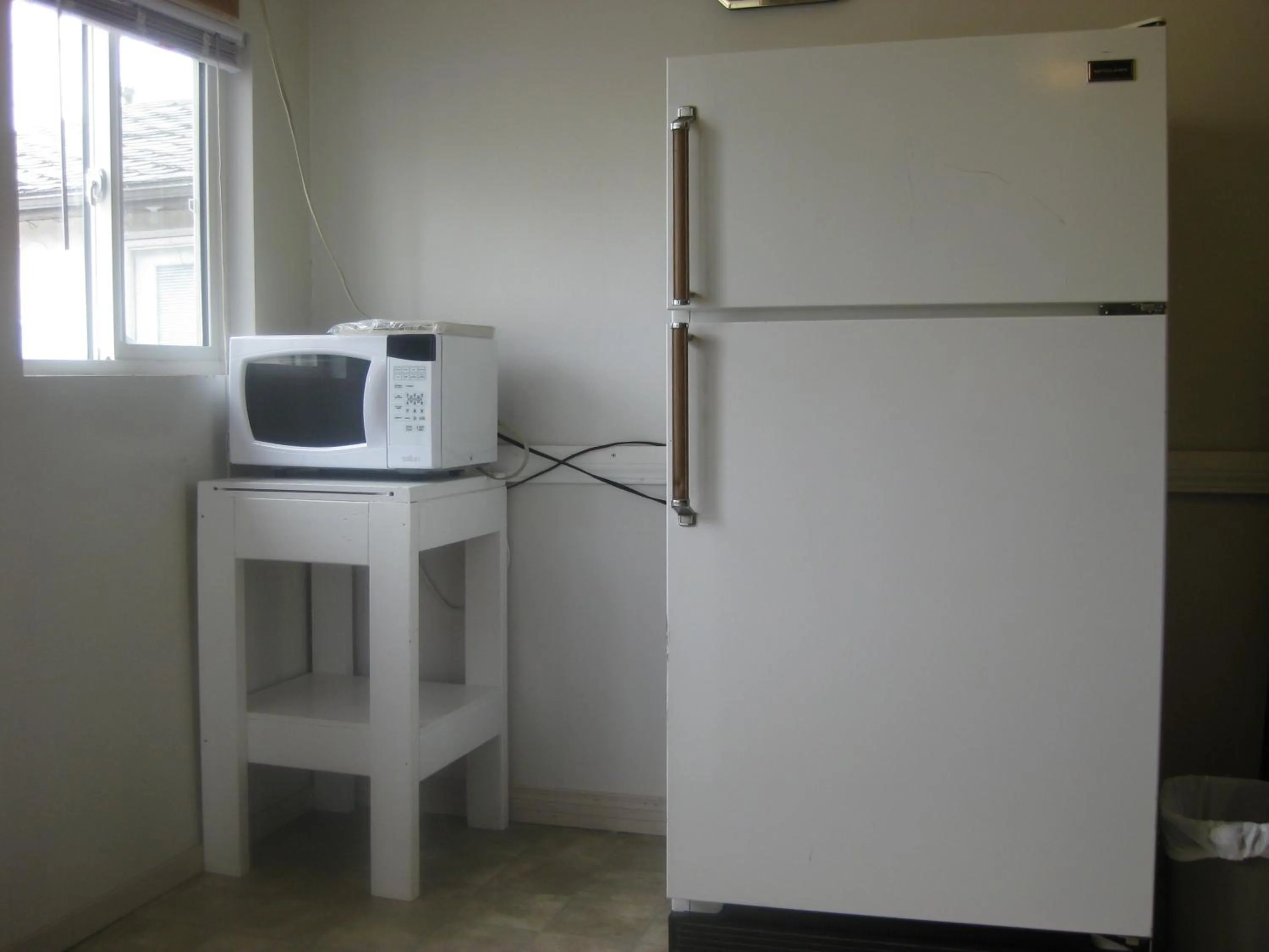 Kitchen or kitchenette in Hat Motel