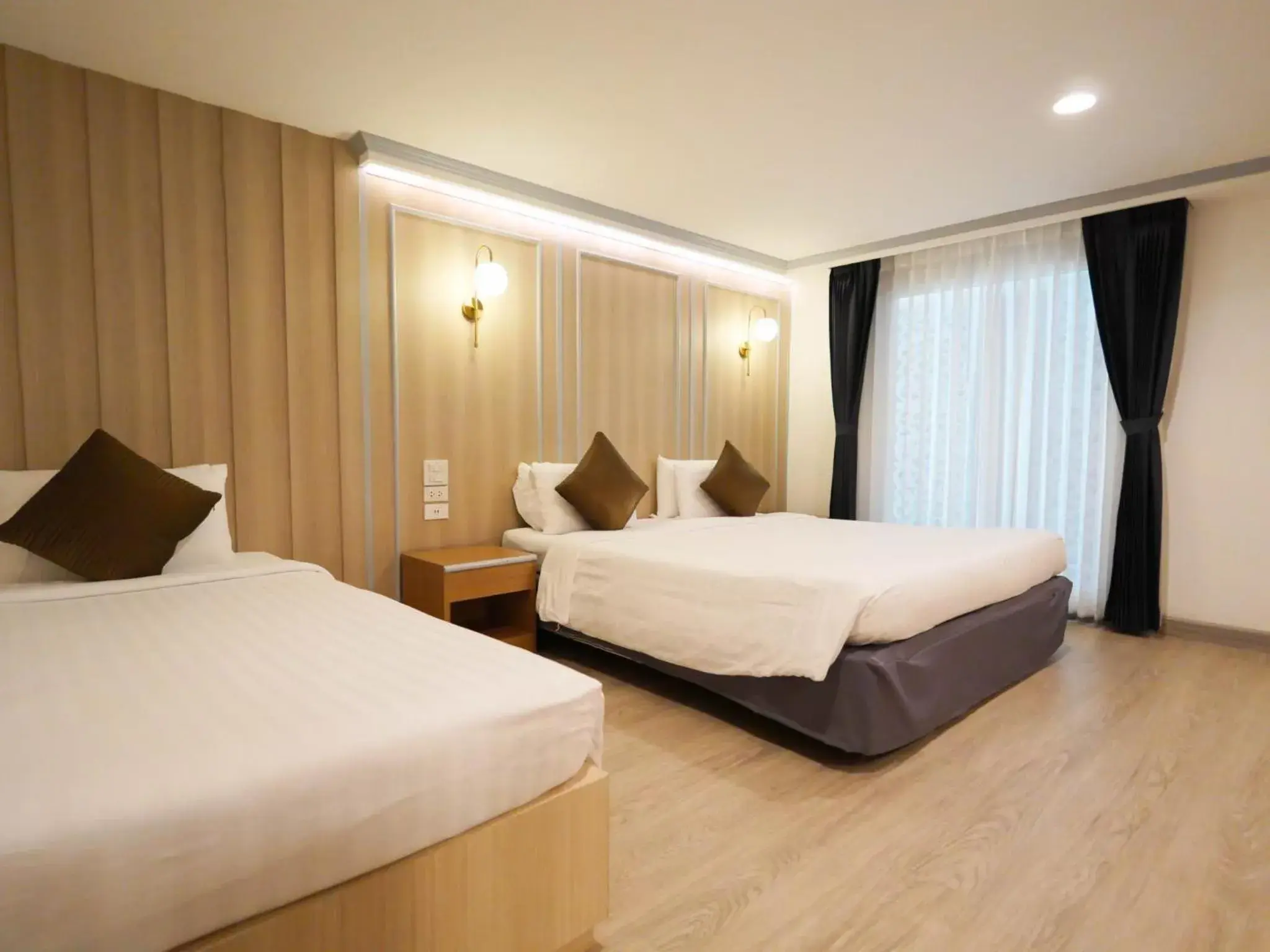 Bed in Sakol Hotel Bed in Sakol Hotel